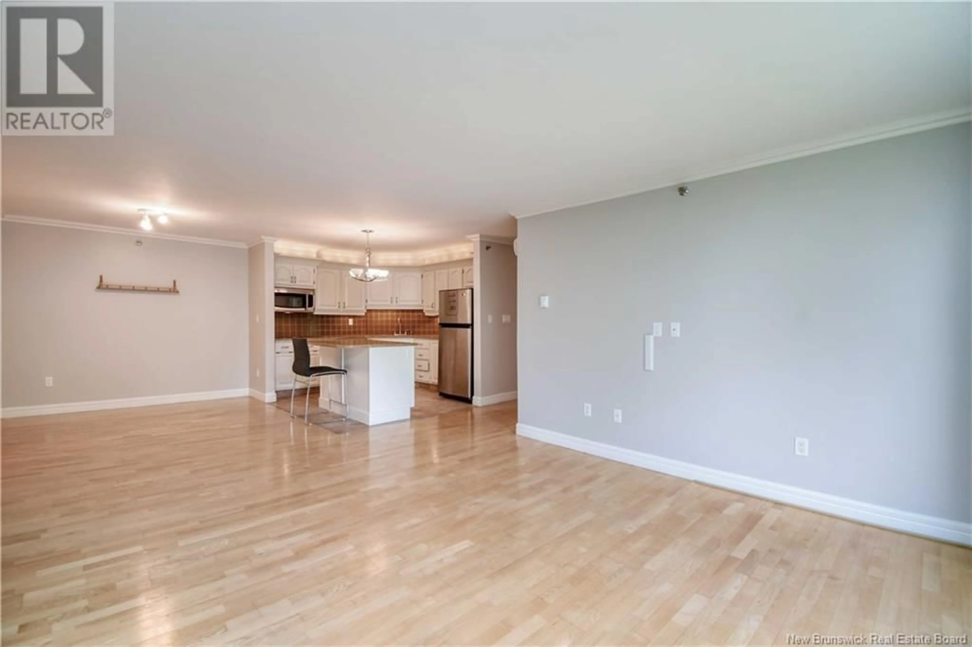 A pic of a room, wood floors for 191 Queen Street Unit# 206, Moncton New Brunswick E1C5Z6