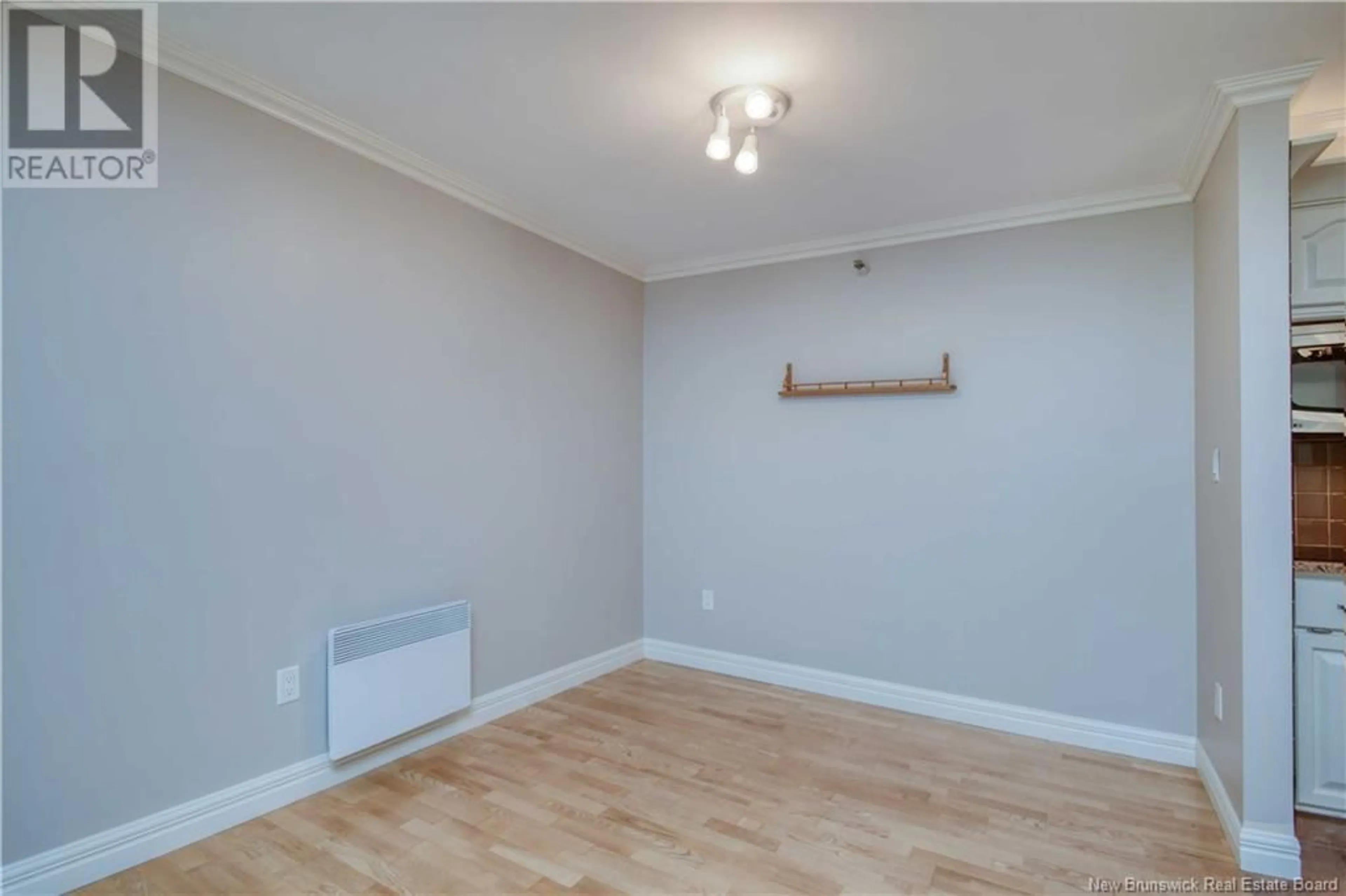 A pic of a room, wood floors for 191 Queen Street Unit# 206, Moncton New Brunswick E1C5Z6