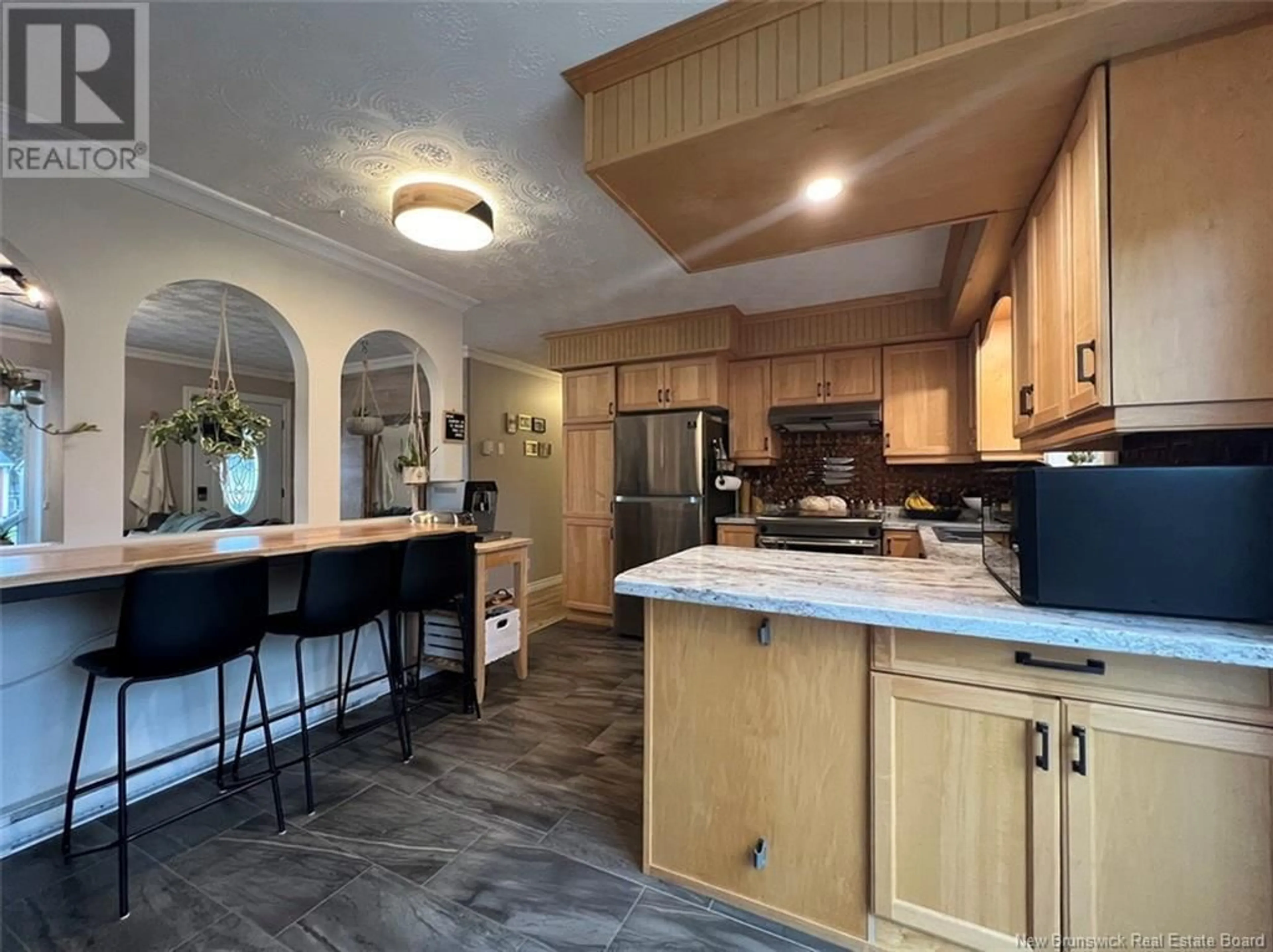 Open concept kitchen for 23 Des Soeurs Street, Saint-Jacques New Brunswick E7B1G5