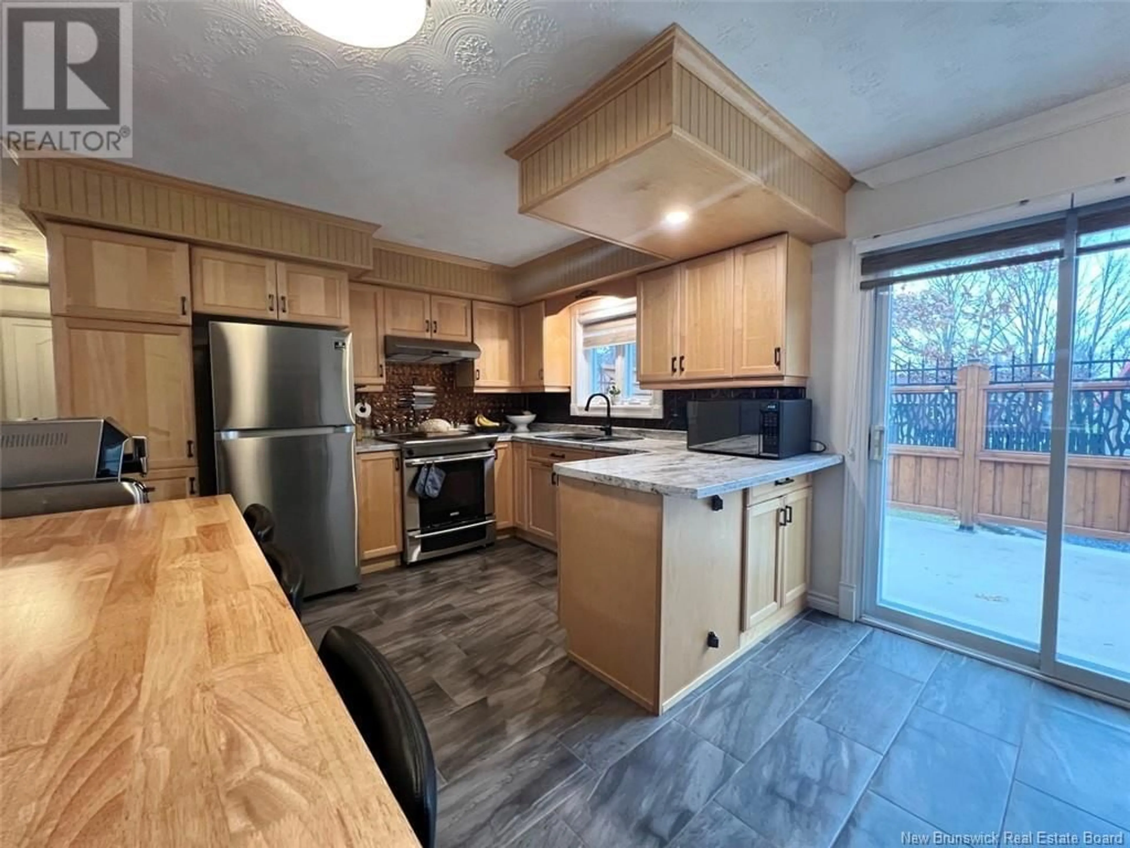 Open concept kitchen for 23 Des Soeurs Street, Saint-Jacques New Brunswick E7B1G5