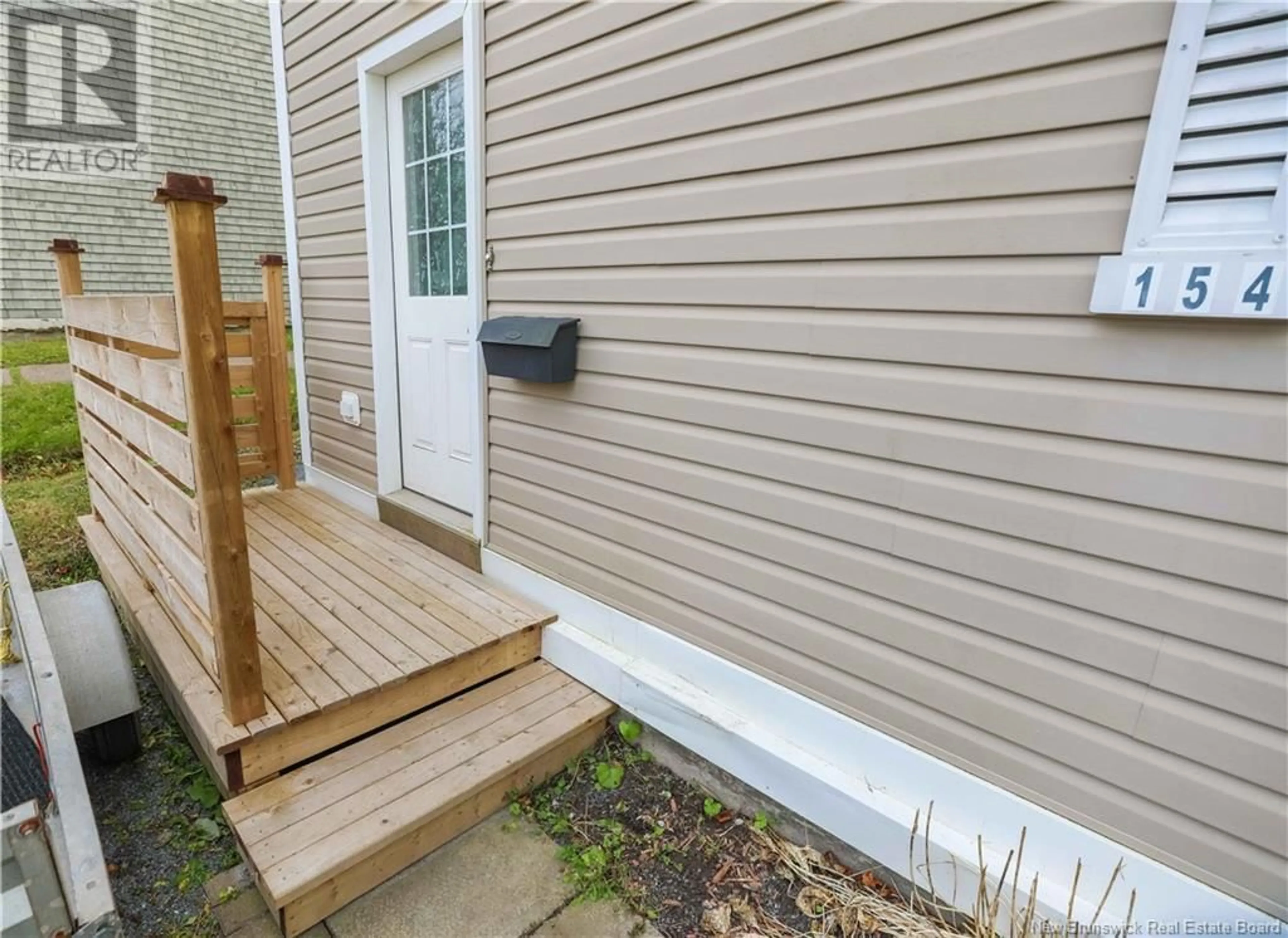 Home with vinyl exterior material for 154 Britain Street, Saint John New Brunswick E2L1X5