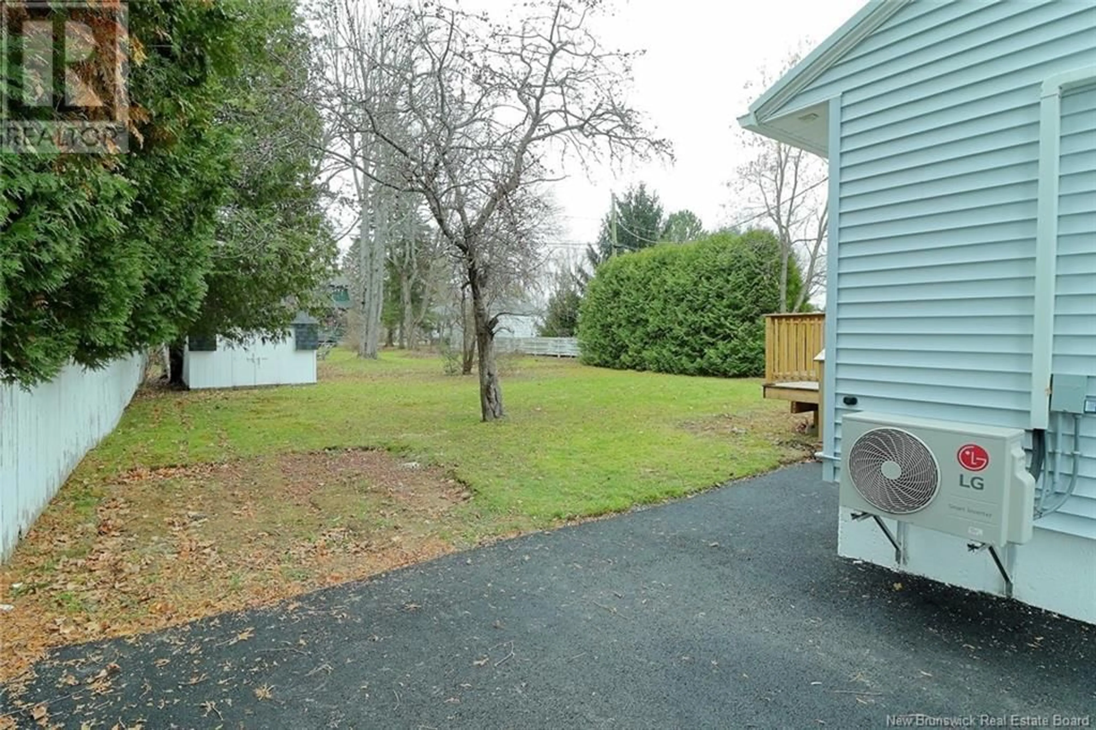 Patio, the fenced backyard for 110 Fraser Avenue, Fredericton New Brunswick E3A2B2