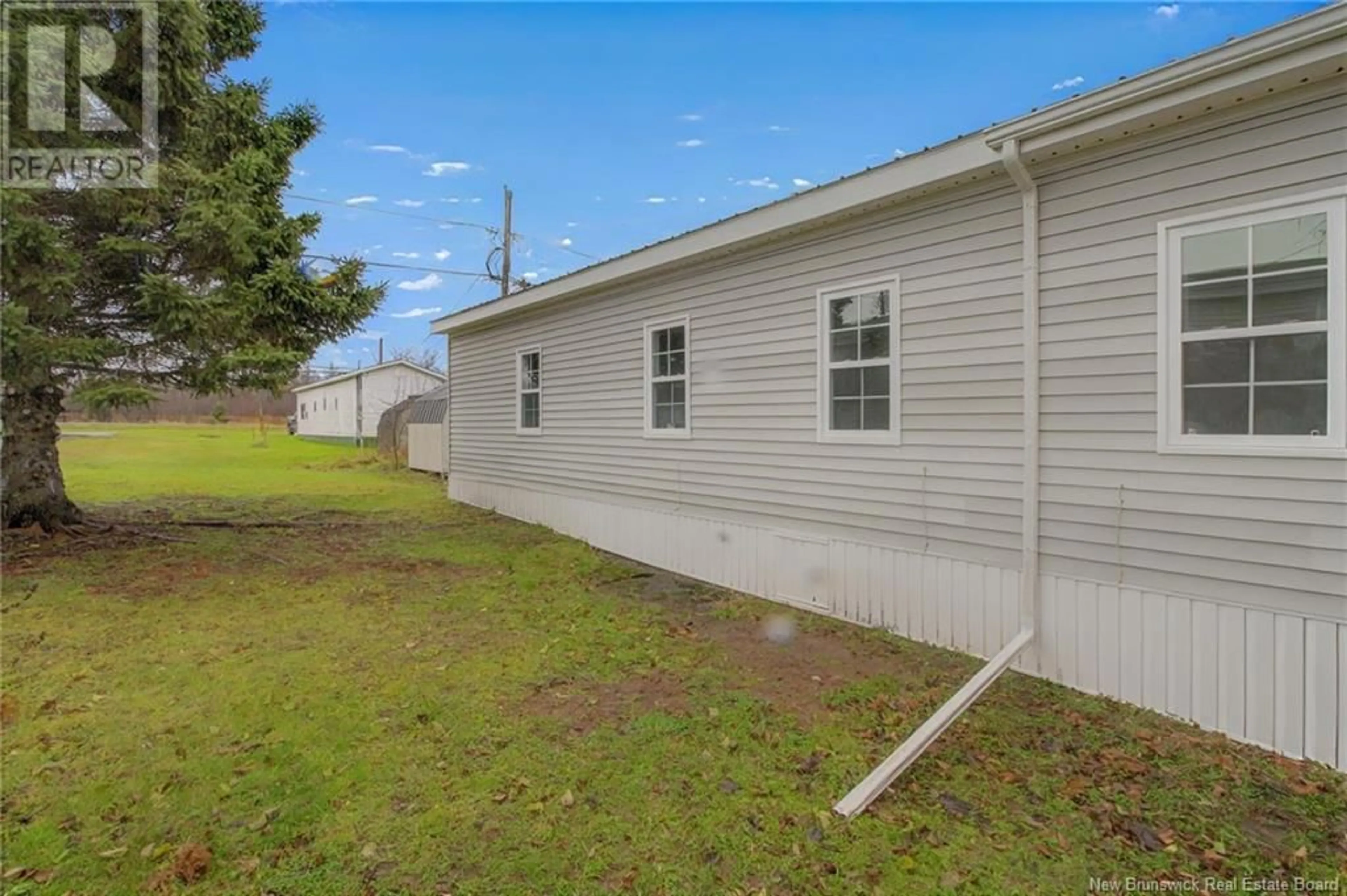 A pic from exterior of the house or condo, the fenced backyard for 45 Rose Avenue, Riverview New Brunswick E1B5B3