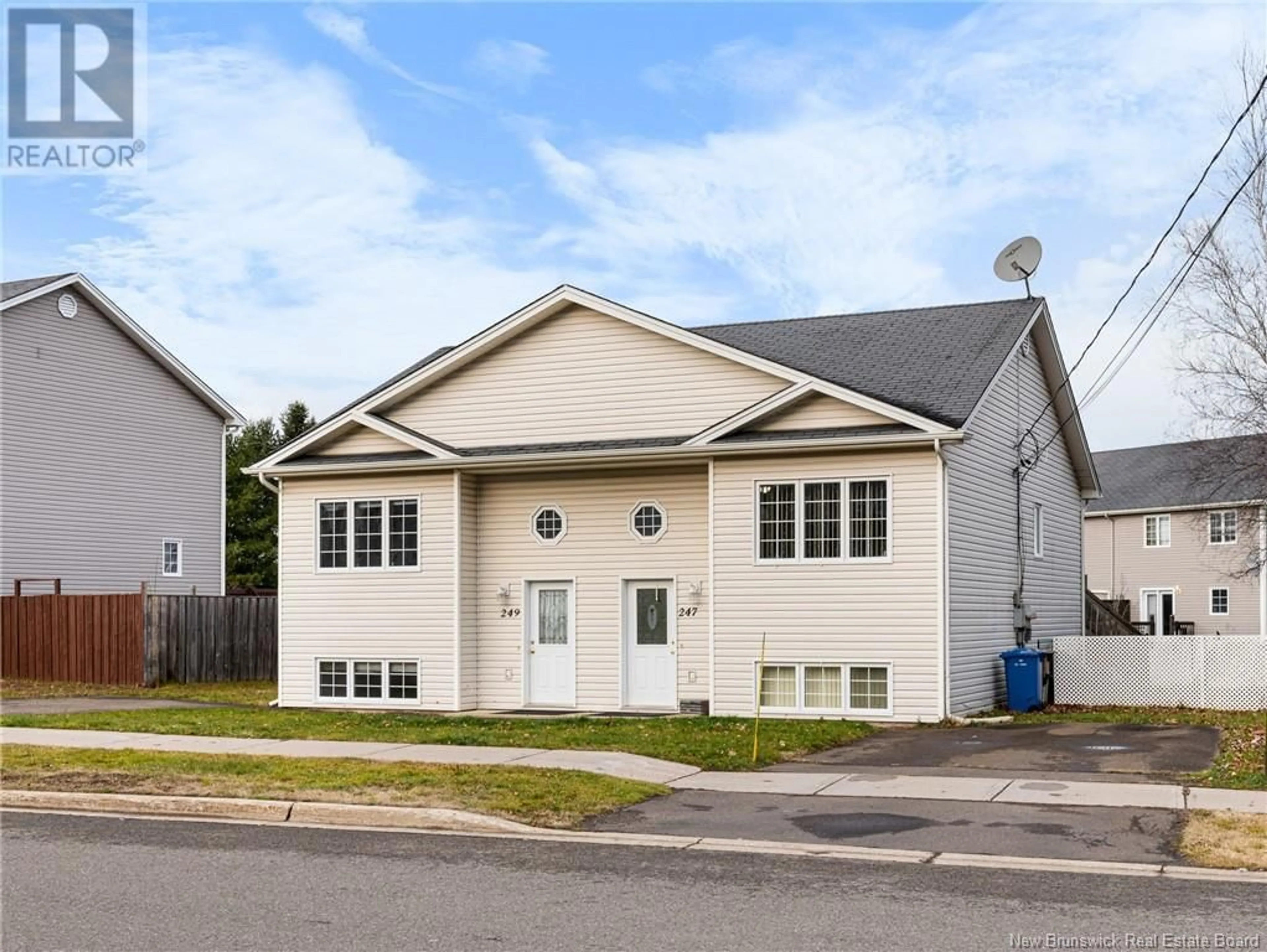 Frontside or backside of a home, the front or back of building for 247-249 Glencairn Drive, Moncton New Brunswick E1G5G7