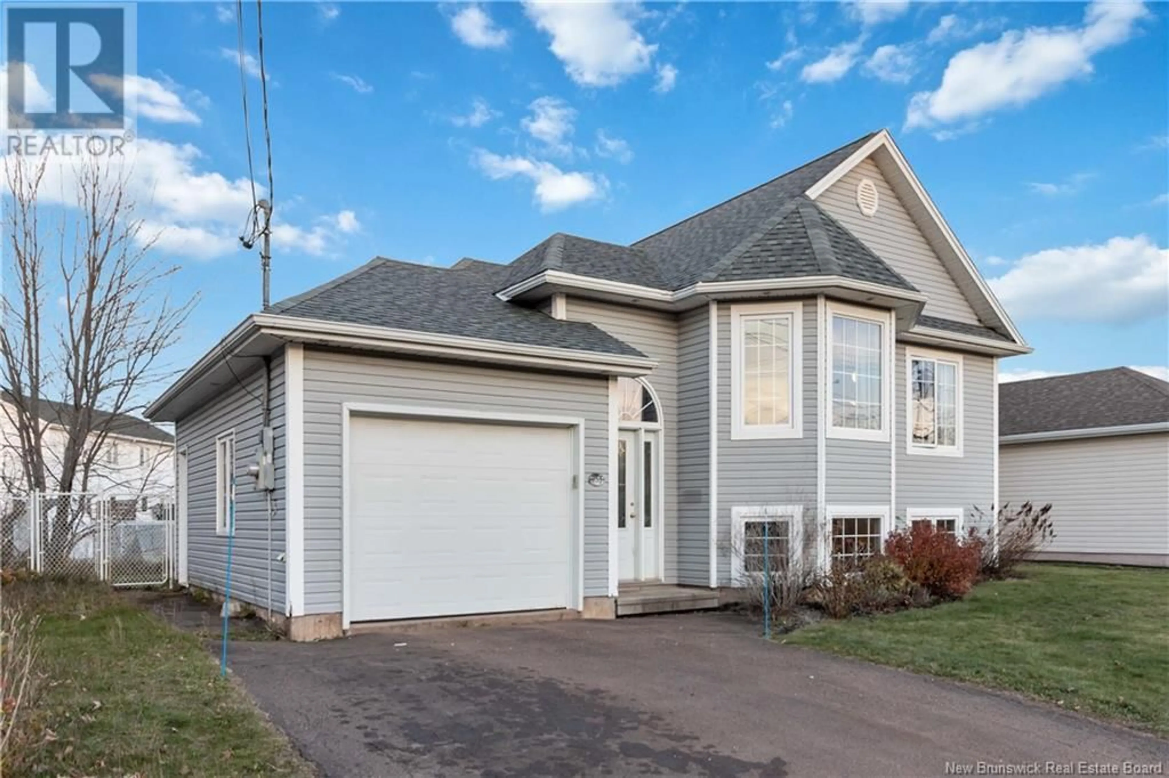 Home with vinyl exterior material, street for 355 TWIN OAKS DRIVE, Moncton New Brunswick E1G4W7