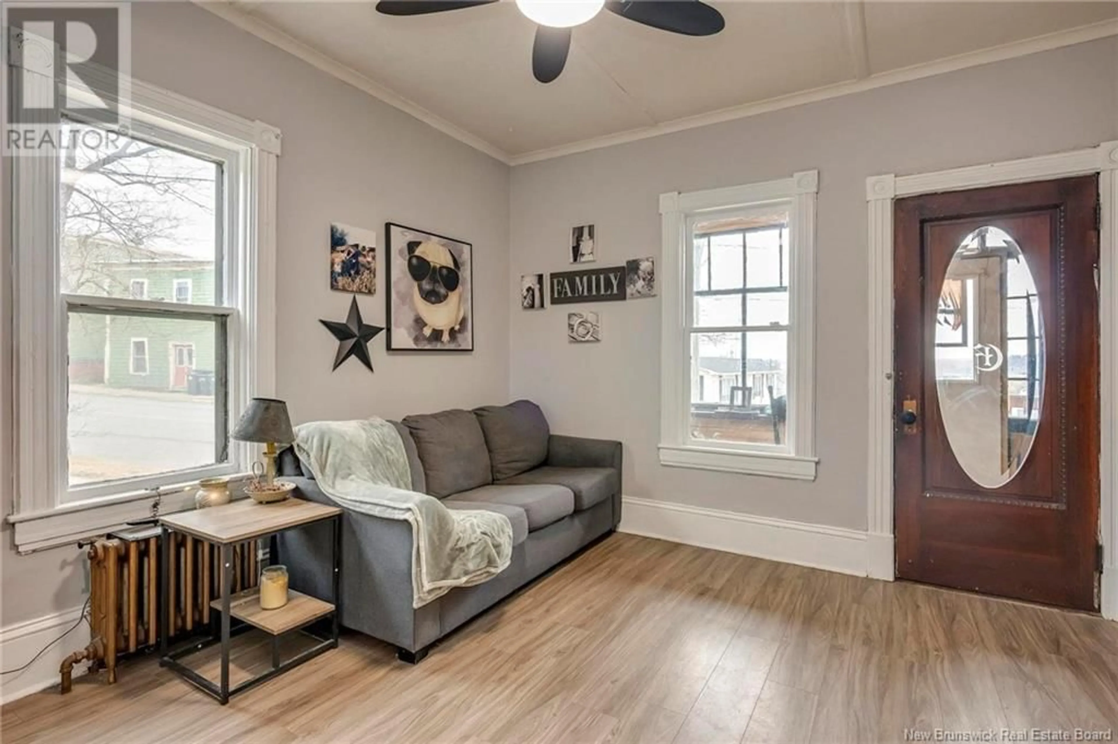 Living room with furniture, wood/laminate floor for 413 PRINCE STREET, Saint John New Brunswick E2M1R2