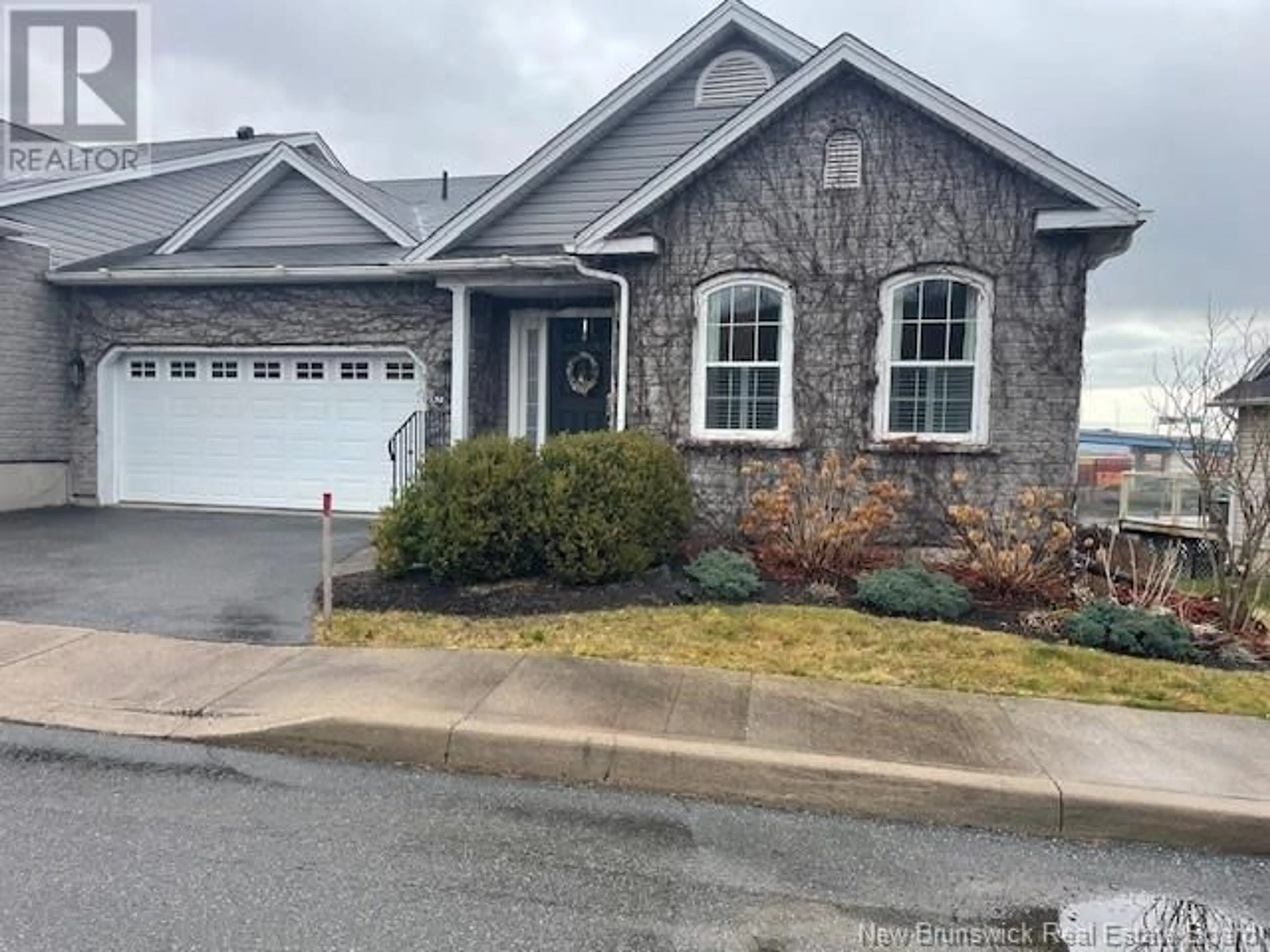 Frontside or backside of a home, the street view for 32 Clipper Passage, Saint John New Brunswick E2K0A9