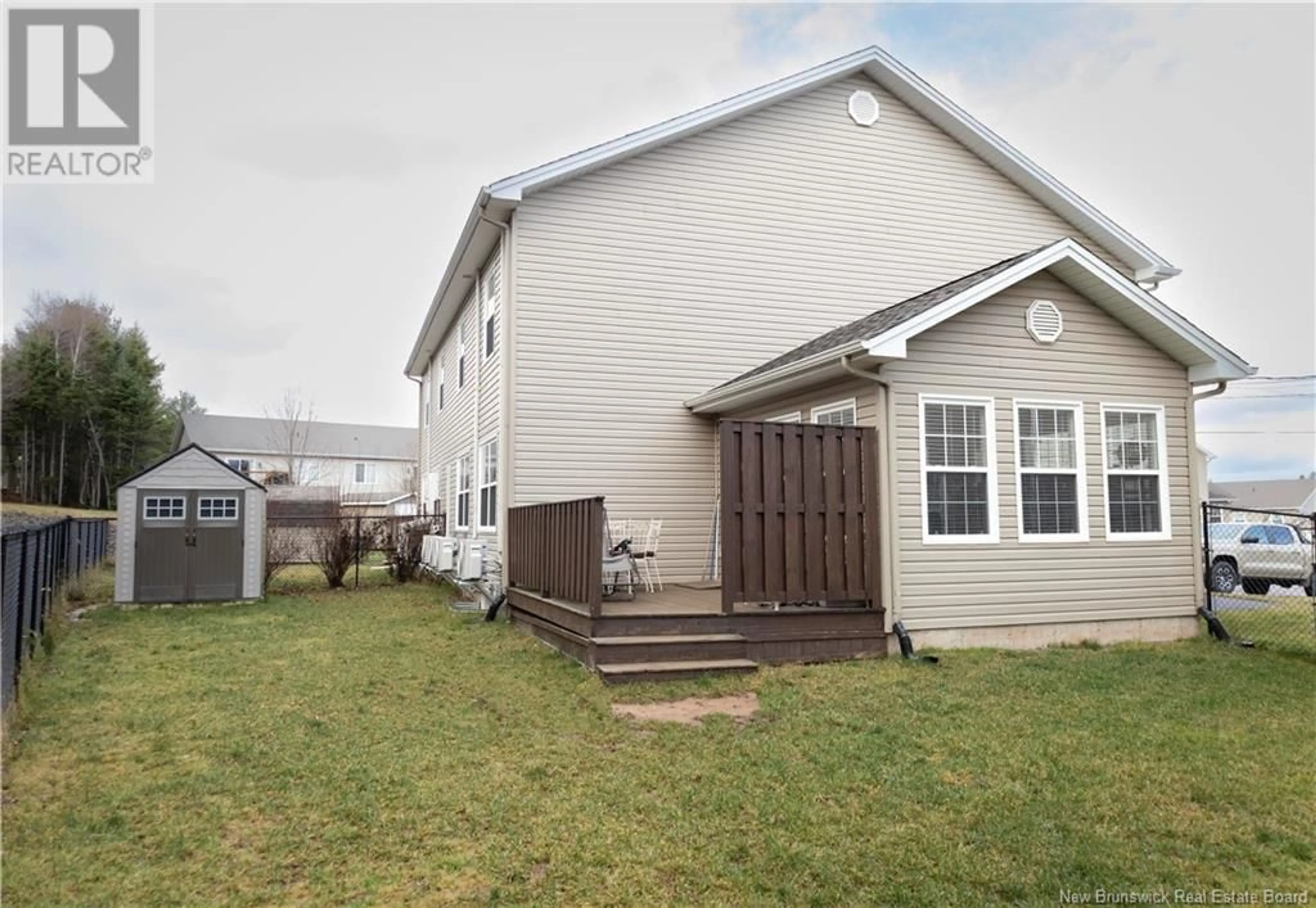 Frontside or backside of a home, the fenced backyard for 42 Poitou, Dieppe New Brunswick E1A9V1