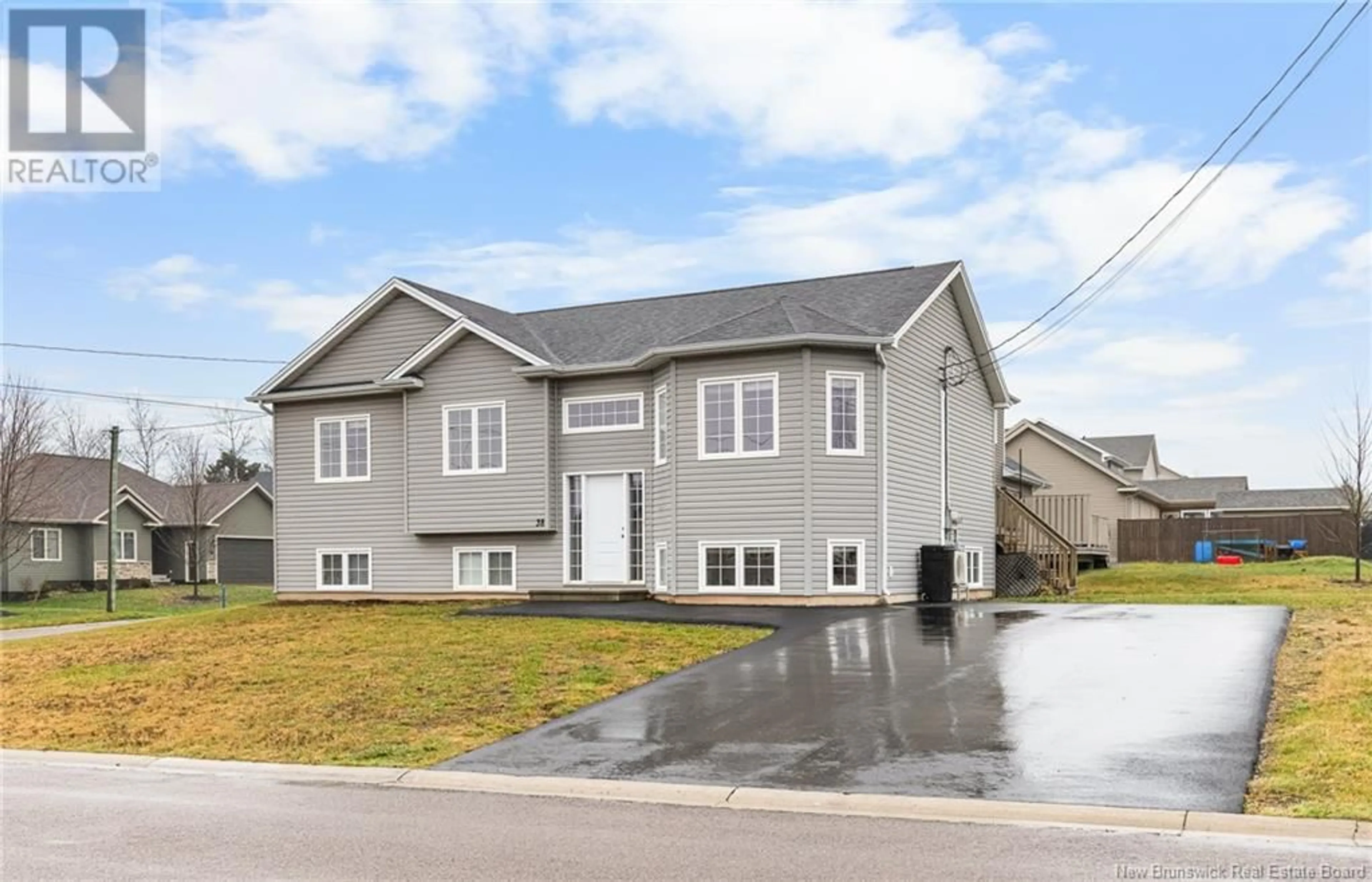 Frontside or backside of a home, the front or back of building for 38 Tilmon Crescent, Dieppe New Brunswick E1A5S2