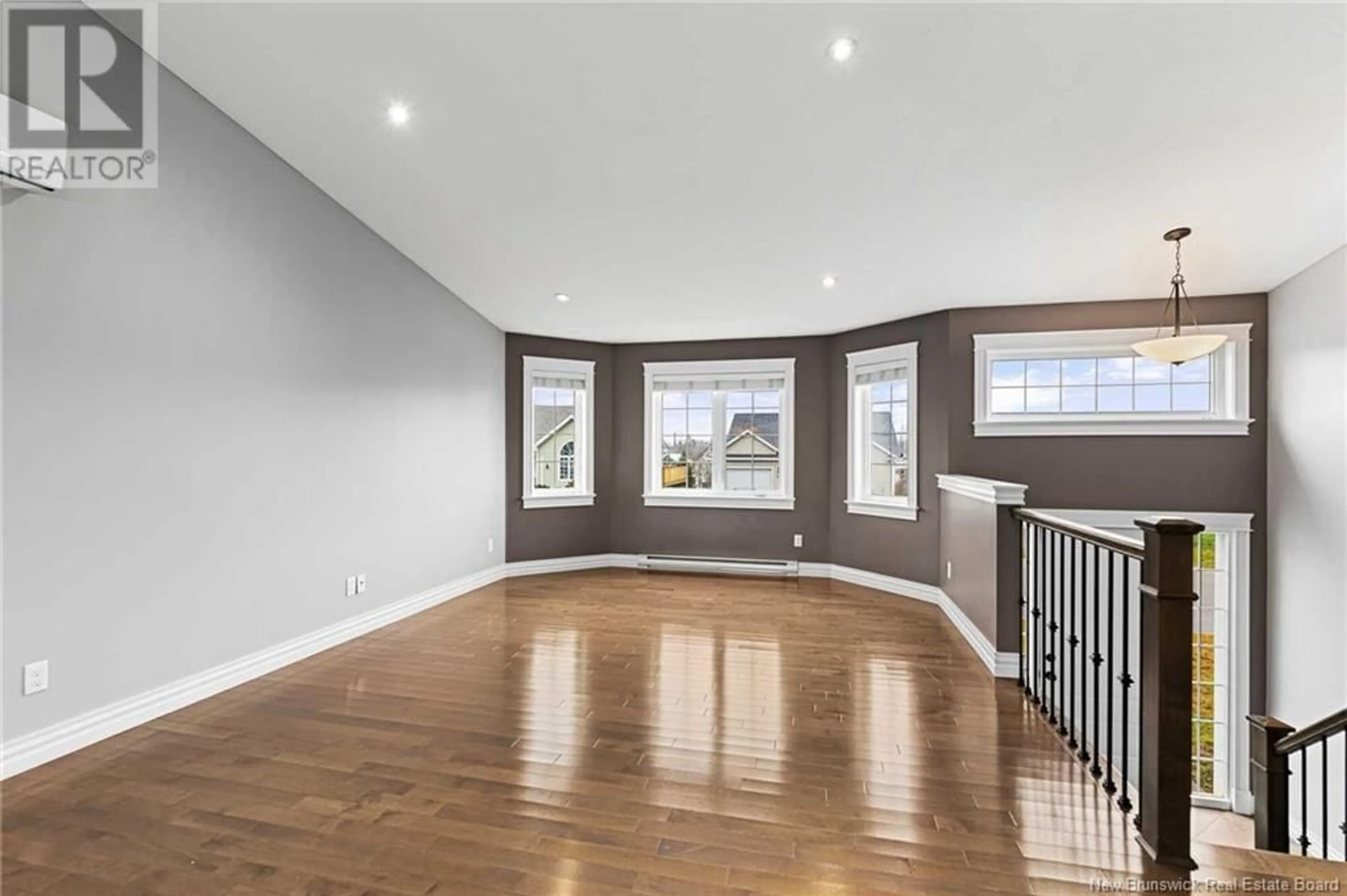 A pic of a room, wood floors for 38 Tilmon Crescent, Dieppe New Brunswick E1A5S2