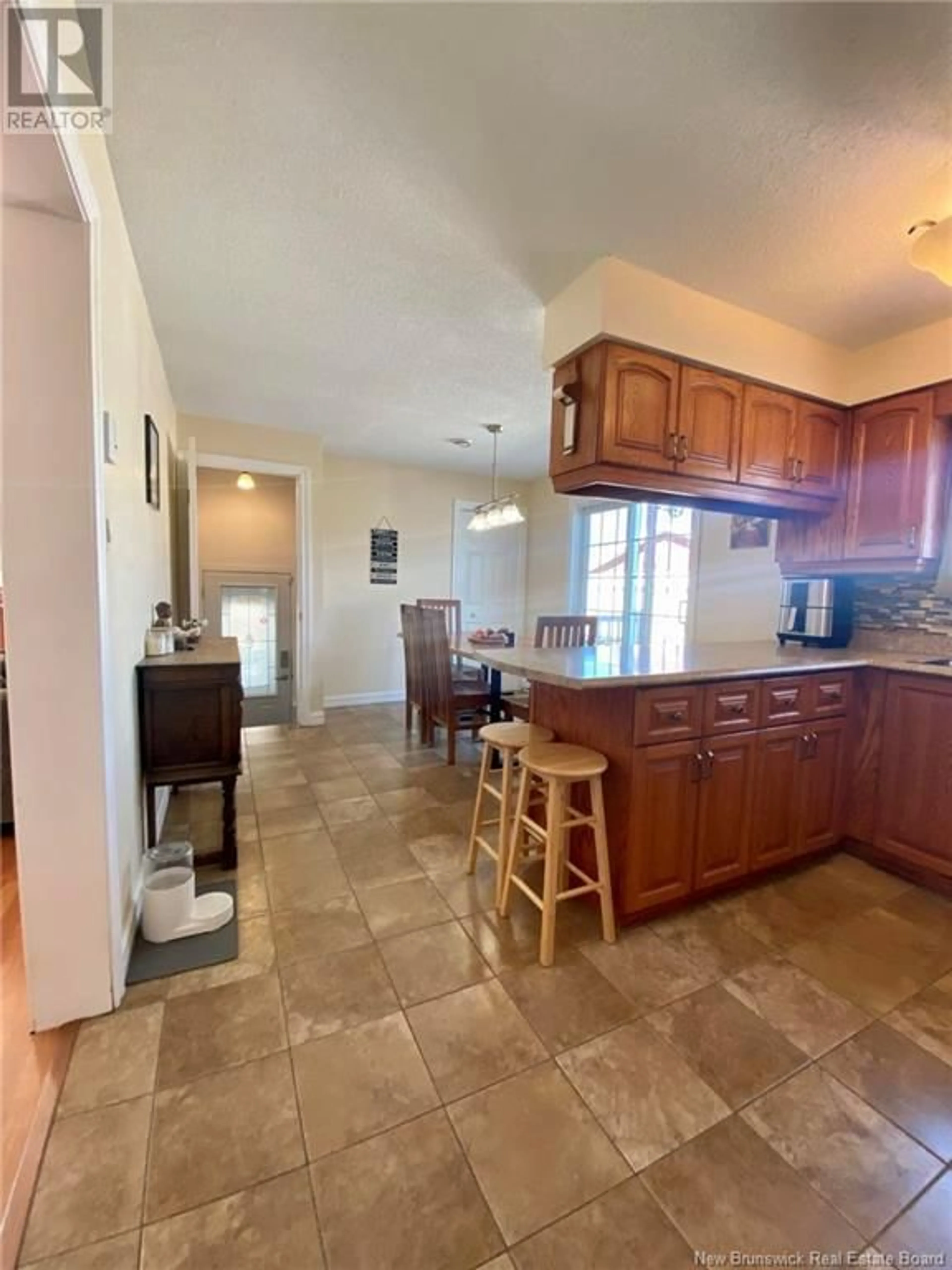 Open concept kitchen for 345 Dover Street, Campbellton New Brunswick E3N3M8