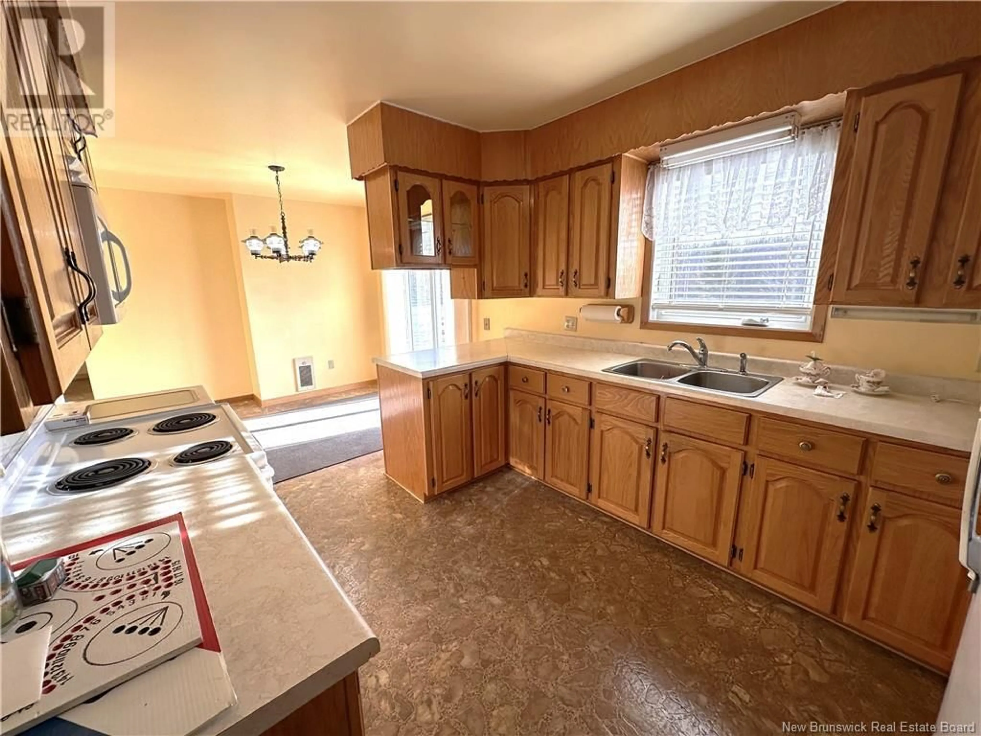 Standard kitchen, wood floors, cottage for 466 Rue Principale, Neguac New Brunswick E9G1N1