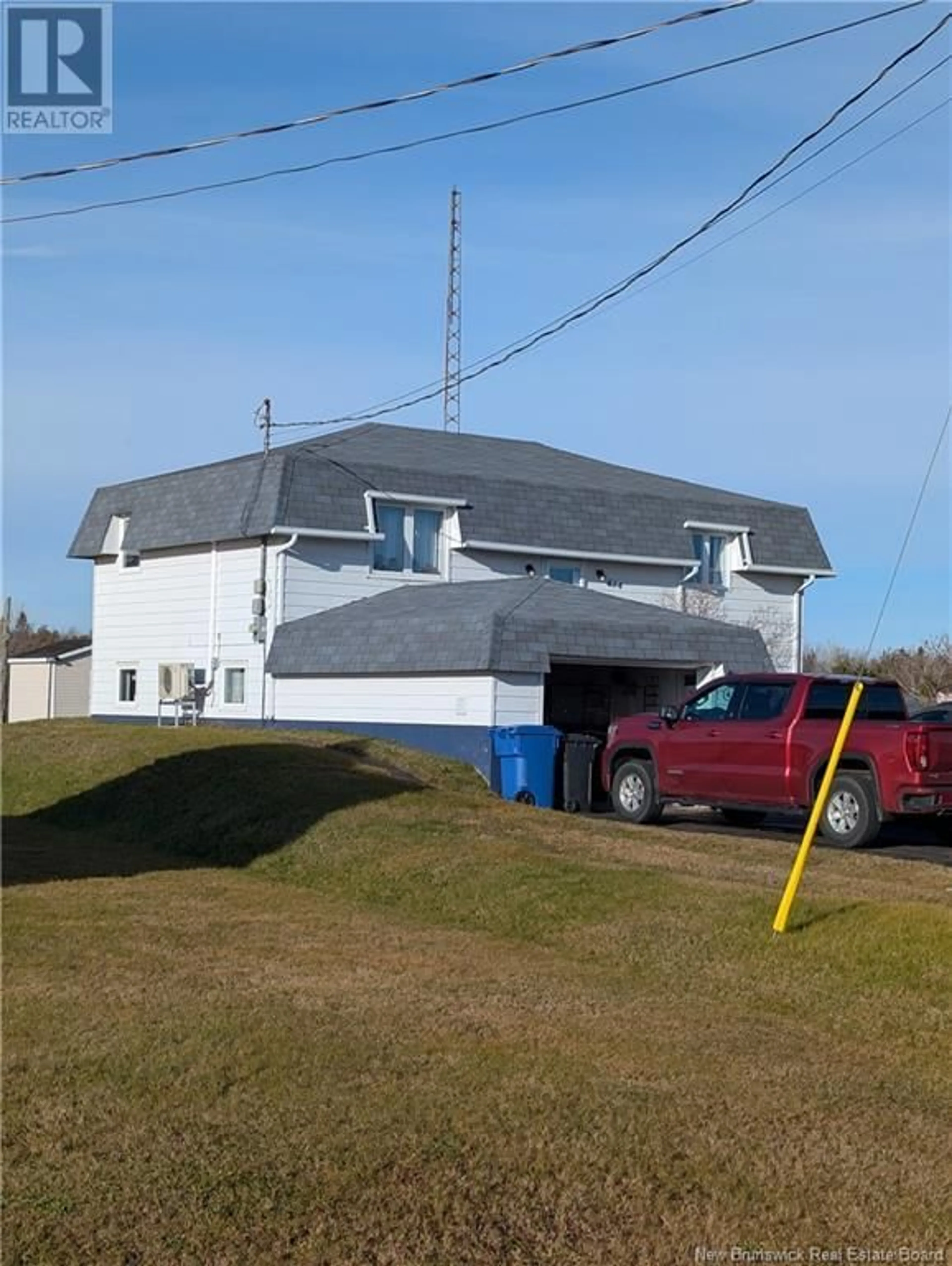 Frontside or backside of a home, the front or back of building for 414 Saint-Raphael Nord, Saint-Marie-Saint-Raphaël New Brunswick E8T1R9