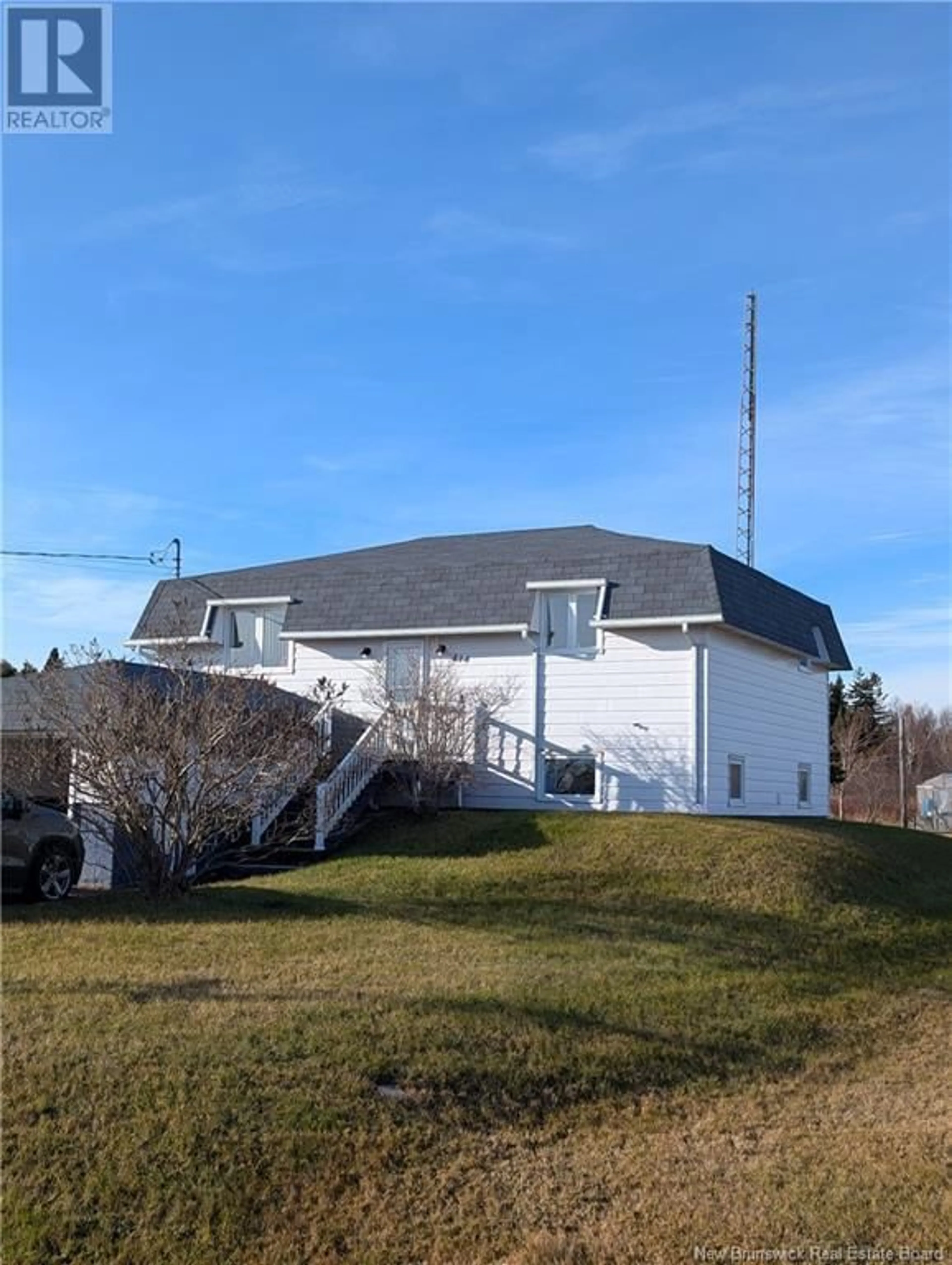 Frontside or backside of a home, the front or back of building for 414 Saint-Raphael Nord, Saint-Marie-Saint-Raphaël New Brunswick E8T1R9