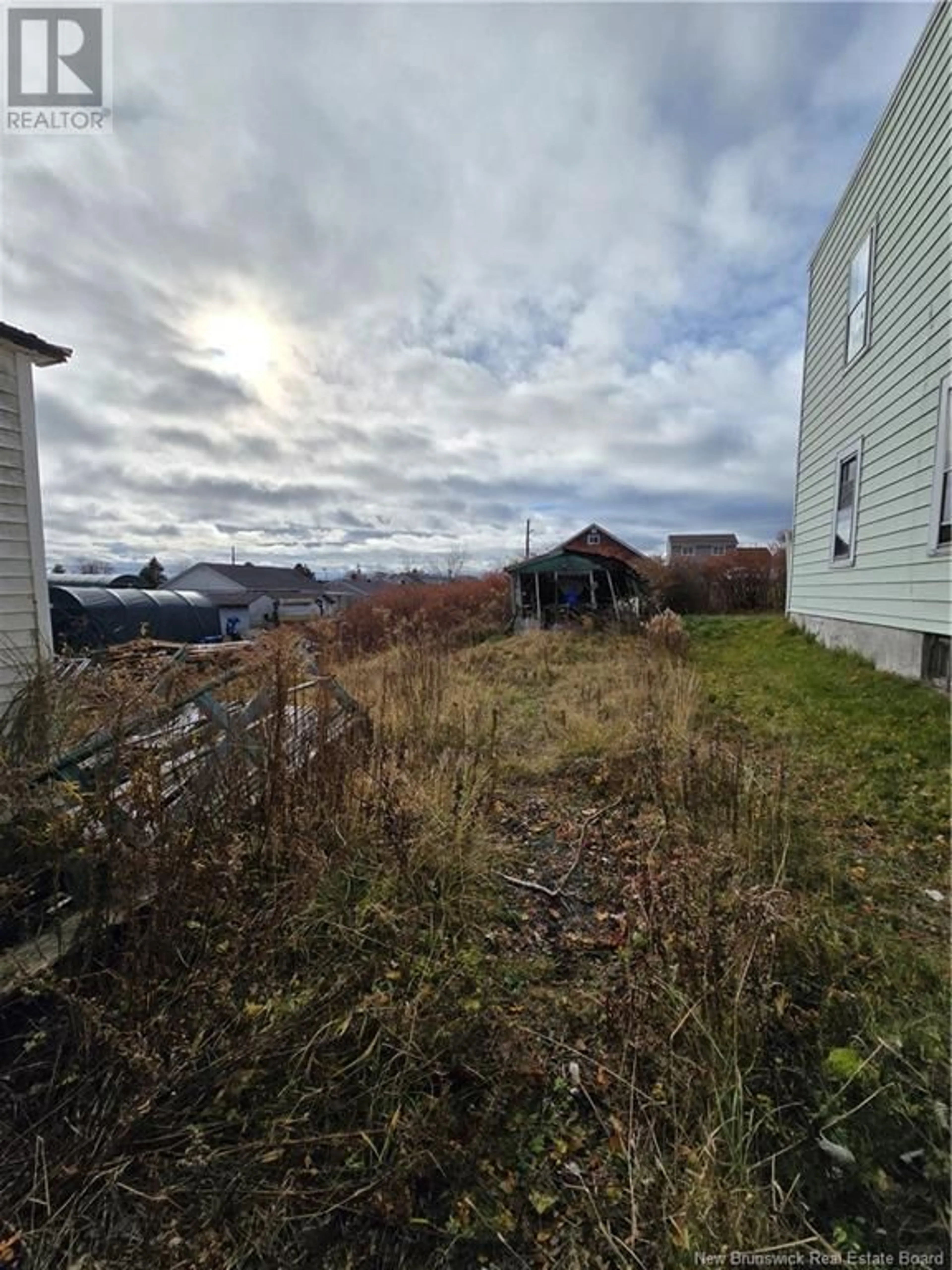 Frontside or backside of a home, the fenced backyard for 178 Belmont Street, Saint John New Brunswick E2J1K5