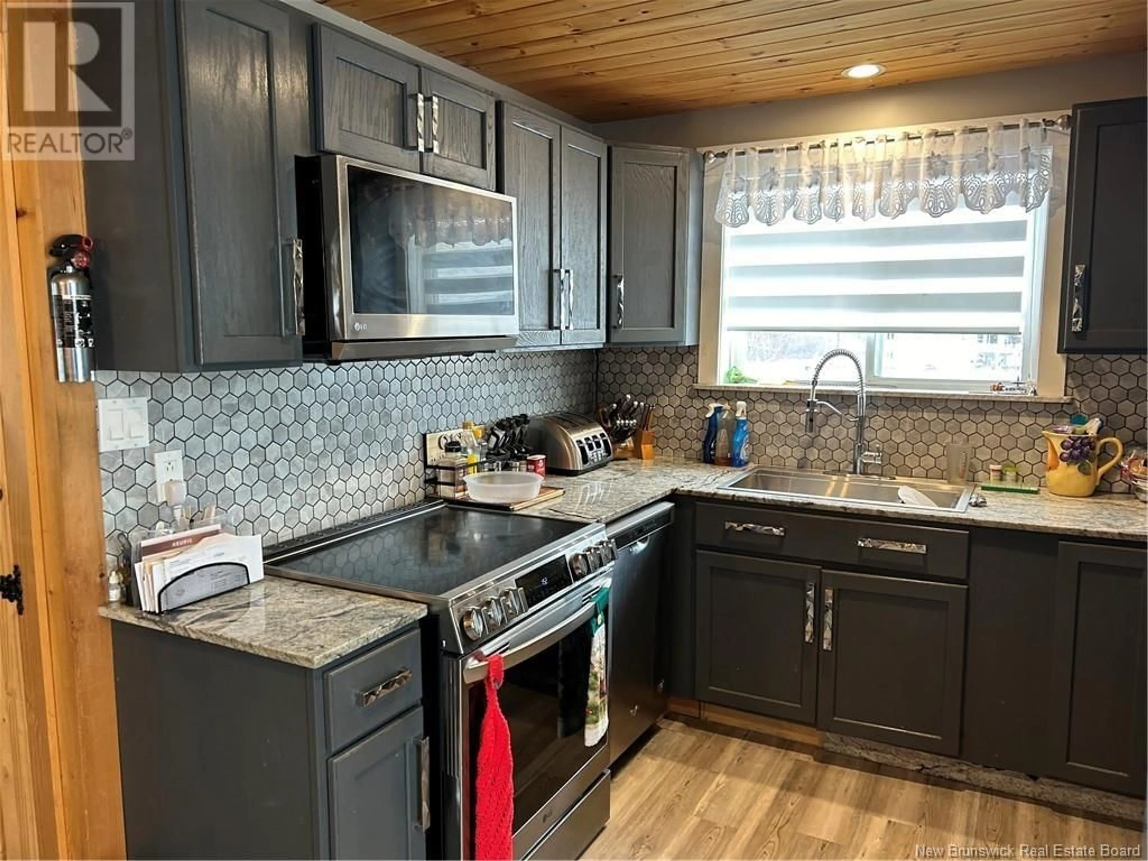 Open concept kitchen for 3663 Rue Luce, Tracadie New Brunswick E1X1B4