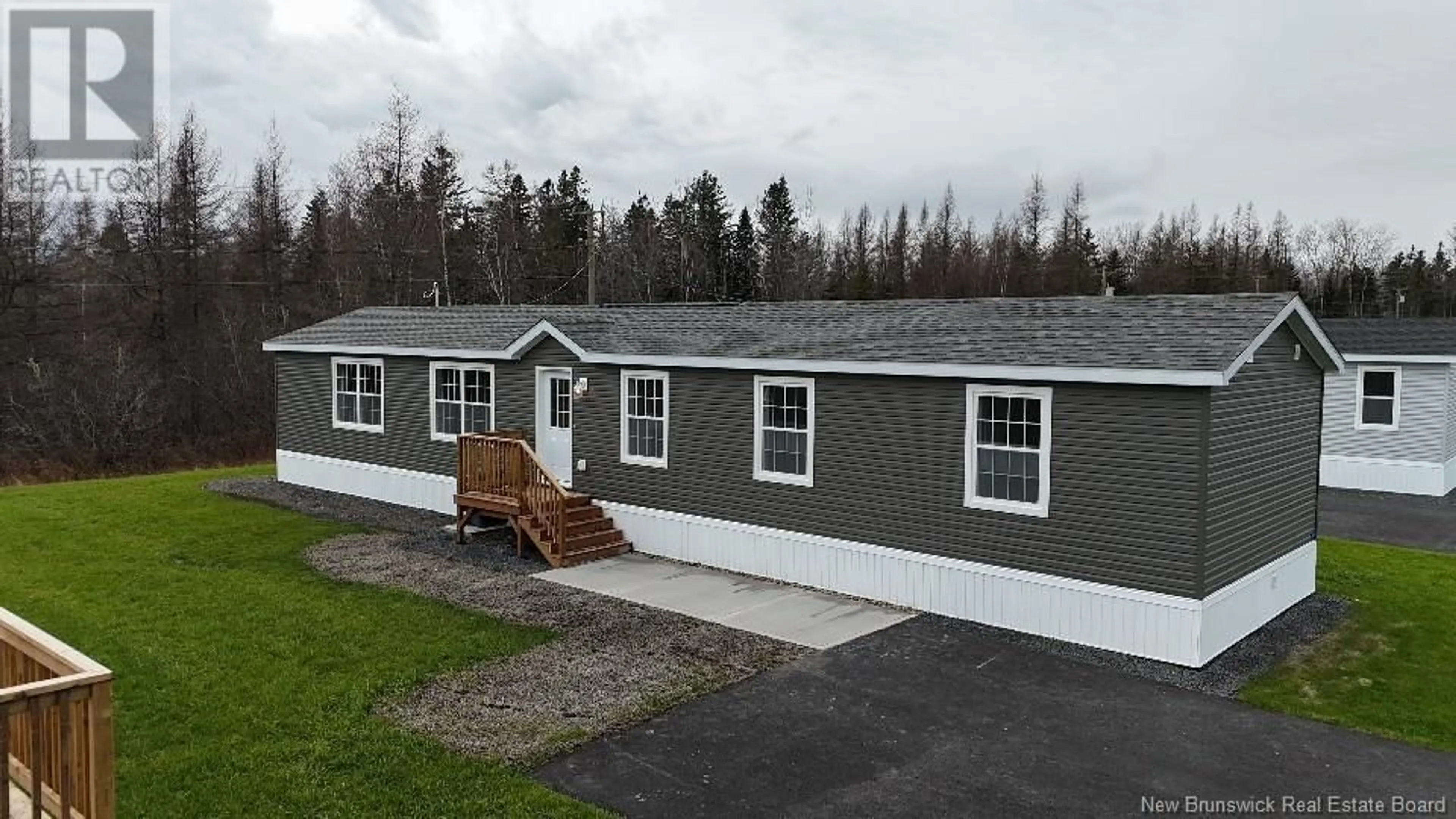 Home with vinyl exterior material for 9 Luanne Drive, Waasis New Brunswick E3B9E5