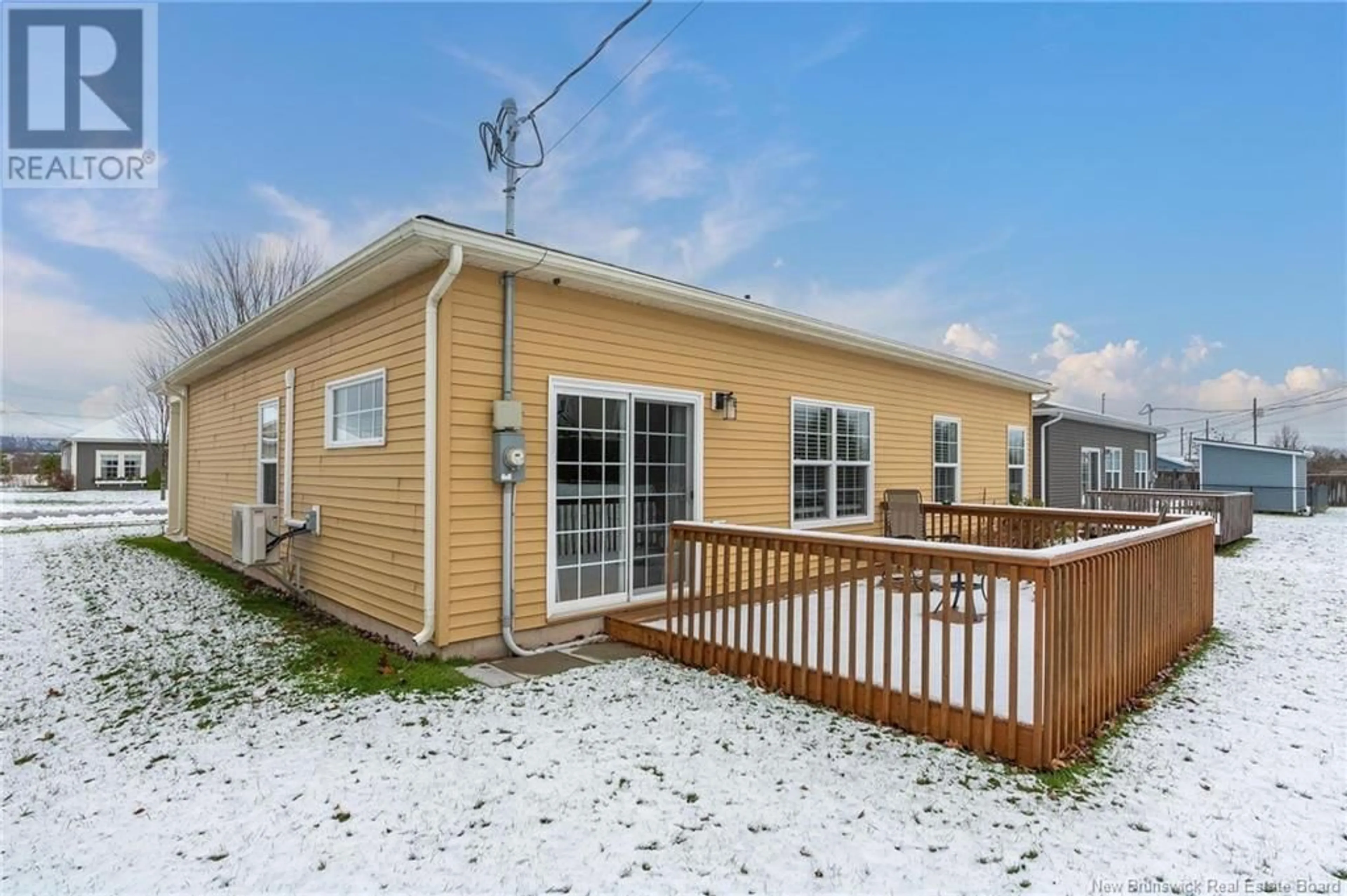 A pic from exterior of the house or condo, the fenced backyard for 35 Carriage Lane, Sussex New Brunswick E4E0H7