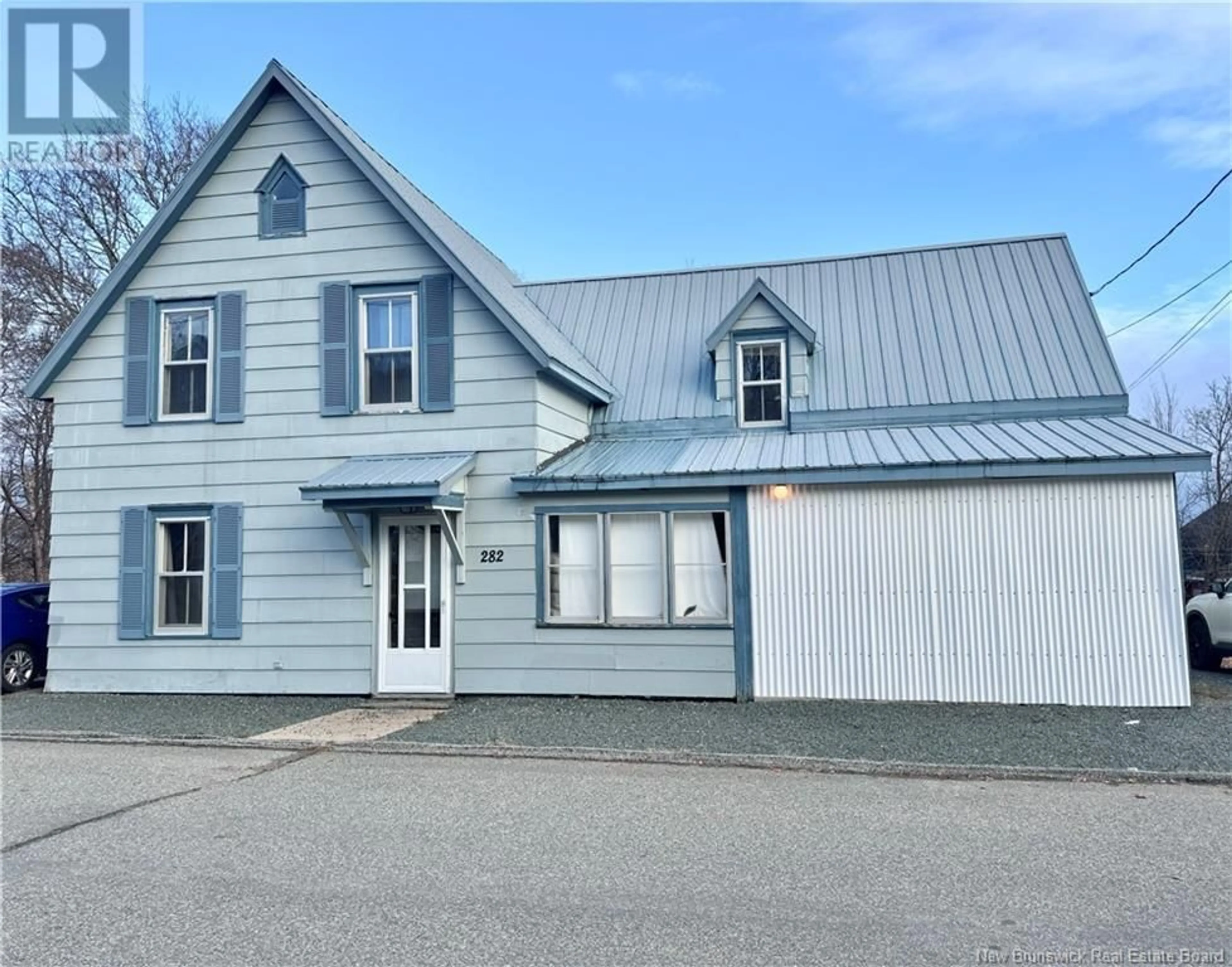 Frontside or backside of a home, the front or back of building for 282 McKenzie Street, Miramichi New Brunswick E1V1V4