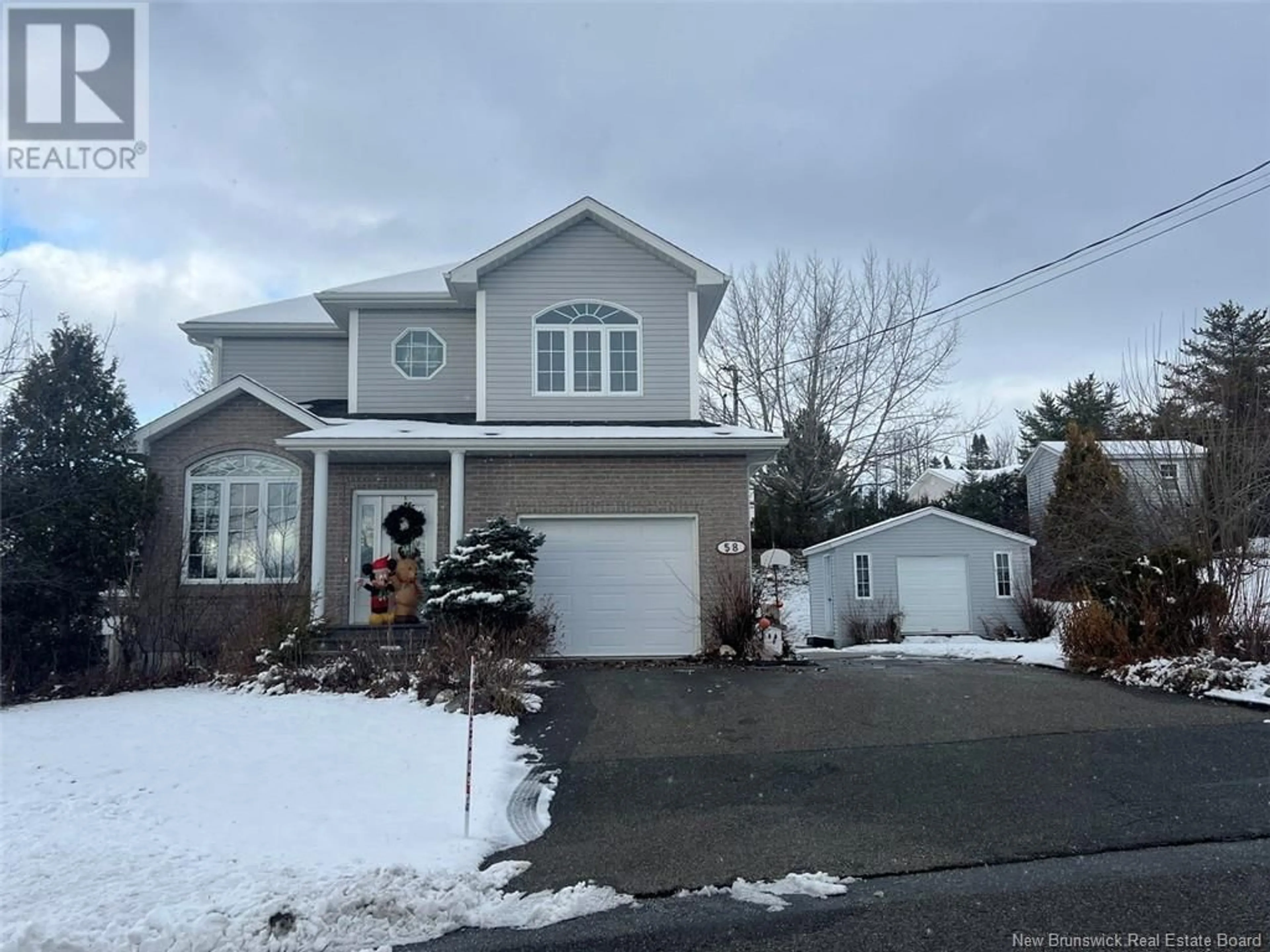 Frontside or backside of a home, the street view for 58 Mgr Dionne Avenue, Edmundston New Brunswick E3V4Y7