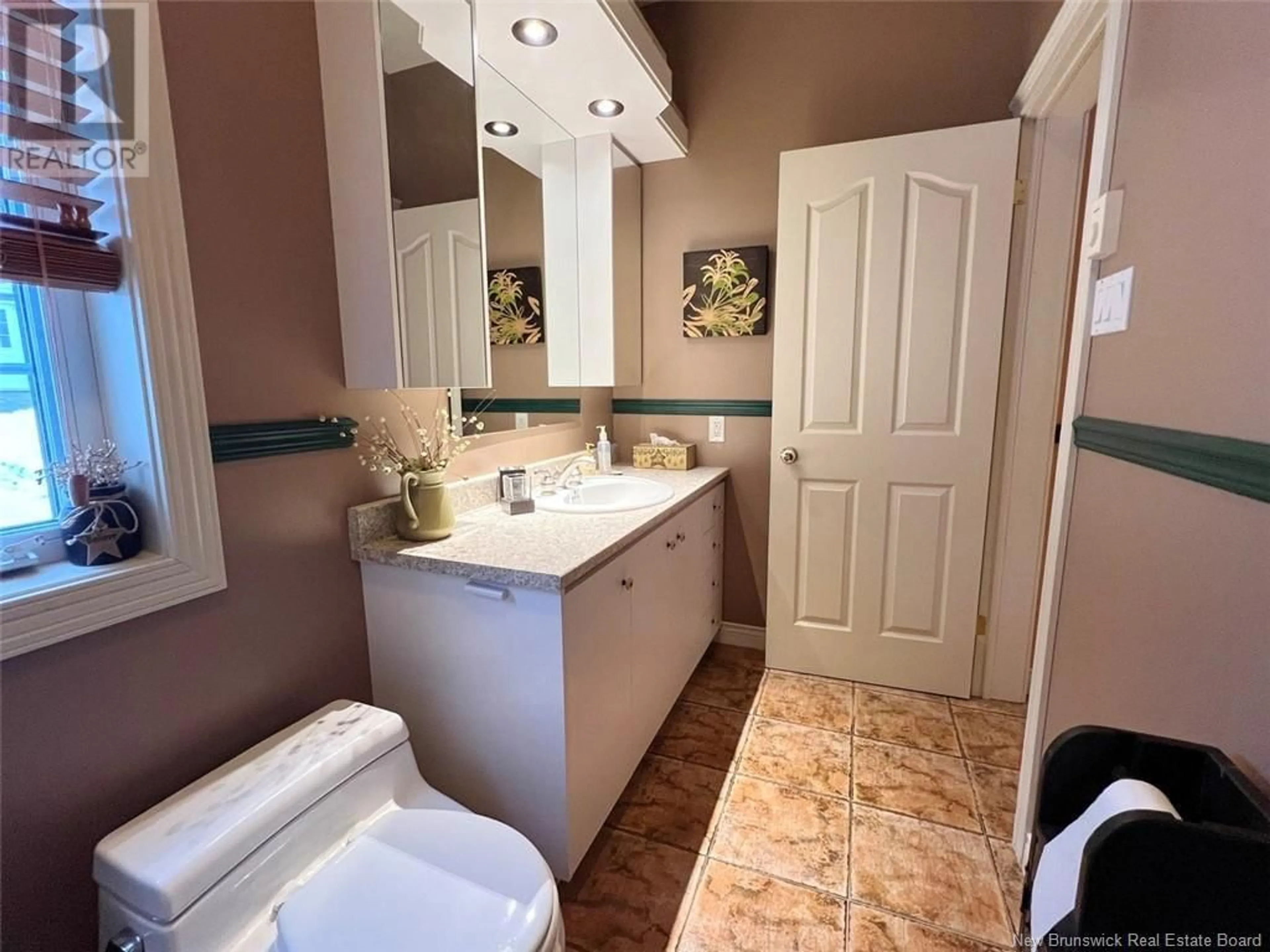 Standard bathroom, ceramic floors for 58 Mgr Dionne Avenue, Edmundston New Brunswick E3V4Y7