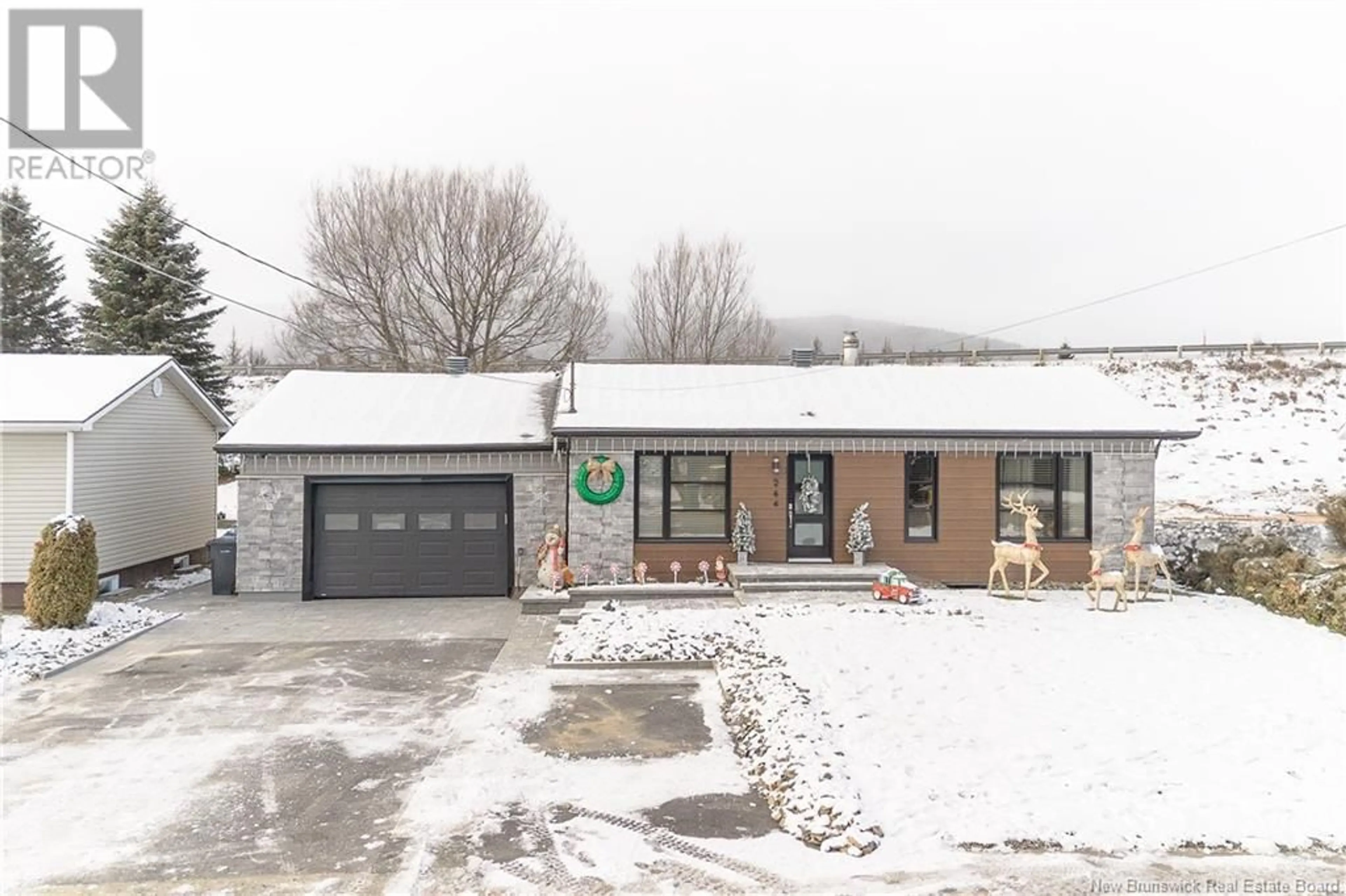 Frontside or backside of a home, the street view for 264 Le Boulevard Street, Saint-Jacques New Brunswick E7B1K3