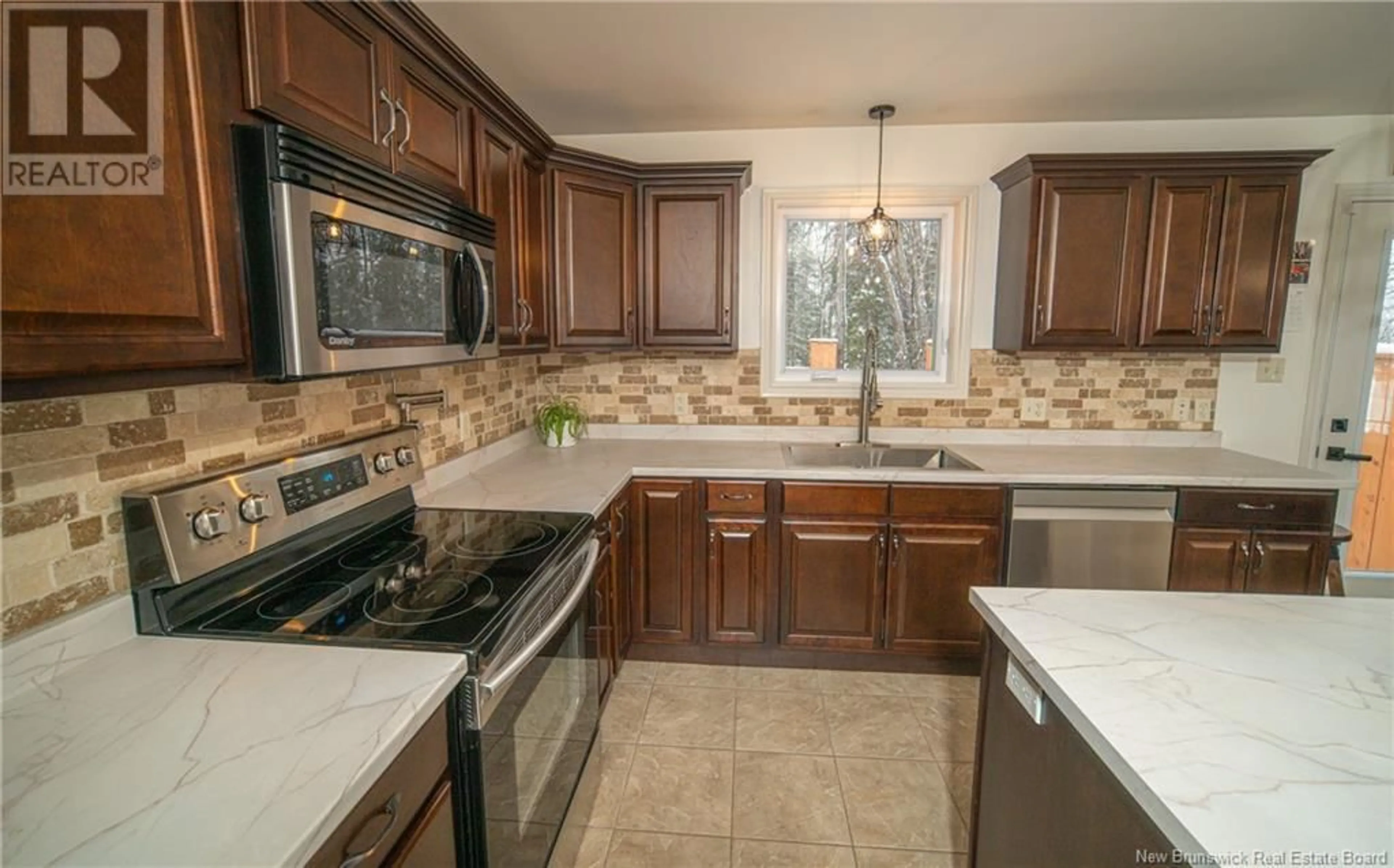 Open concept kitchen for 60 Mirwood Drive, Waasis New Brunswick E3B0P3