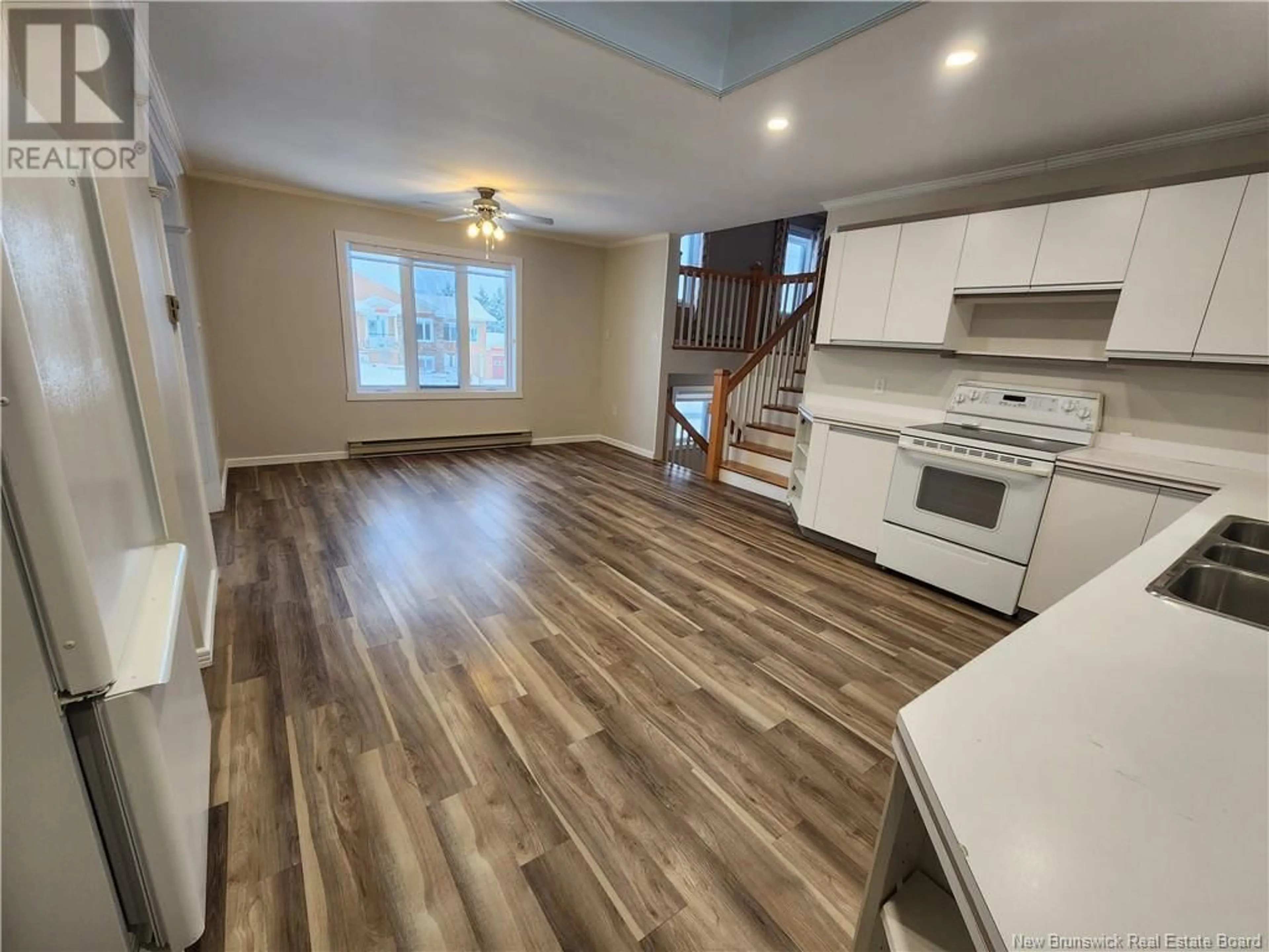 Open concept kitchen, wood/laminate floor for 25 MARCEL STREET, Grand Falls New Brunswick E3Y1B7