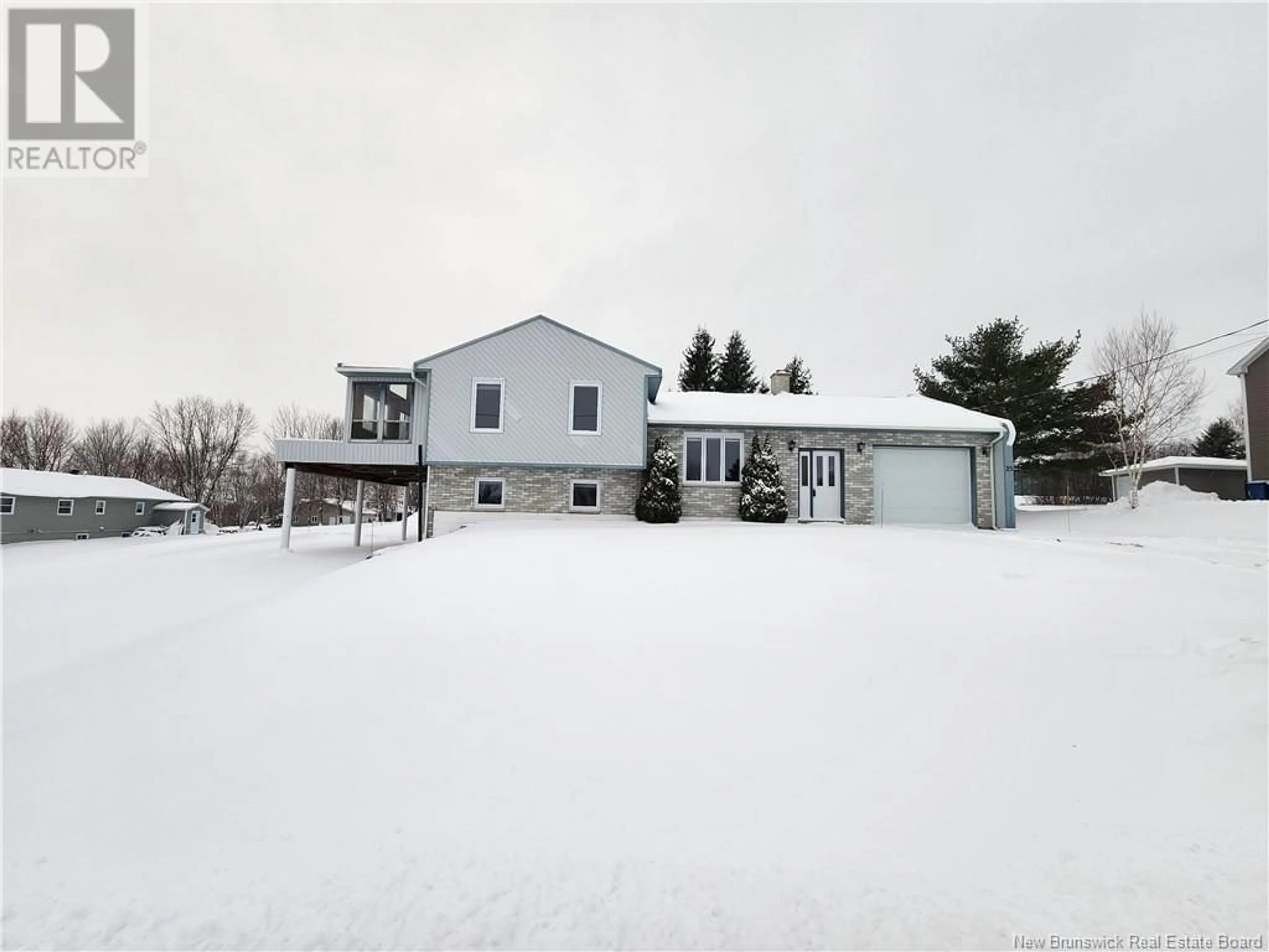 Frontside or backside of a home, the street view for 25 Marcel Street, Grand Falls New Brunswick E3Y1B7