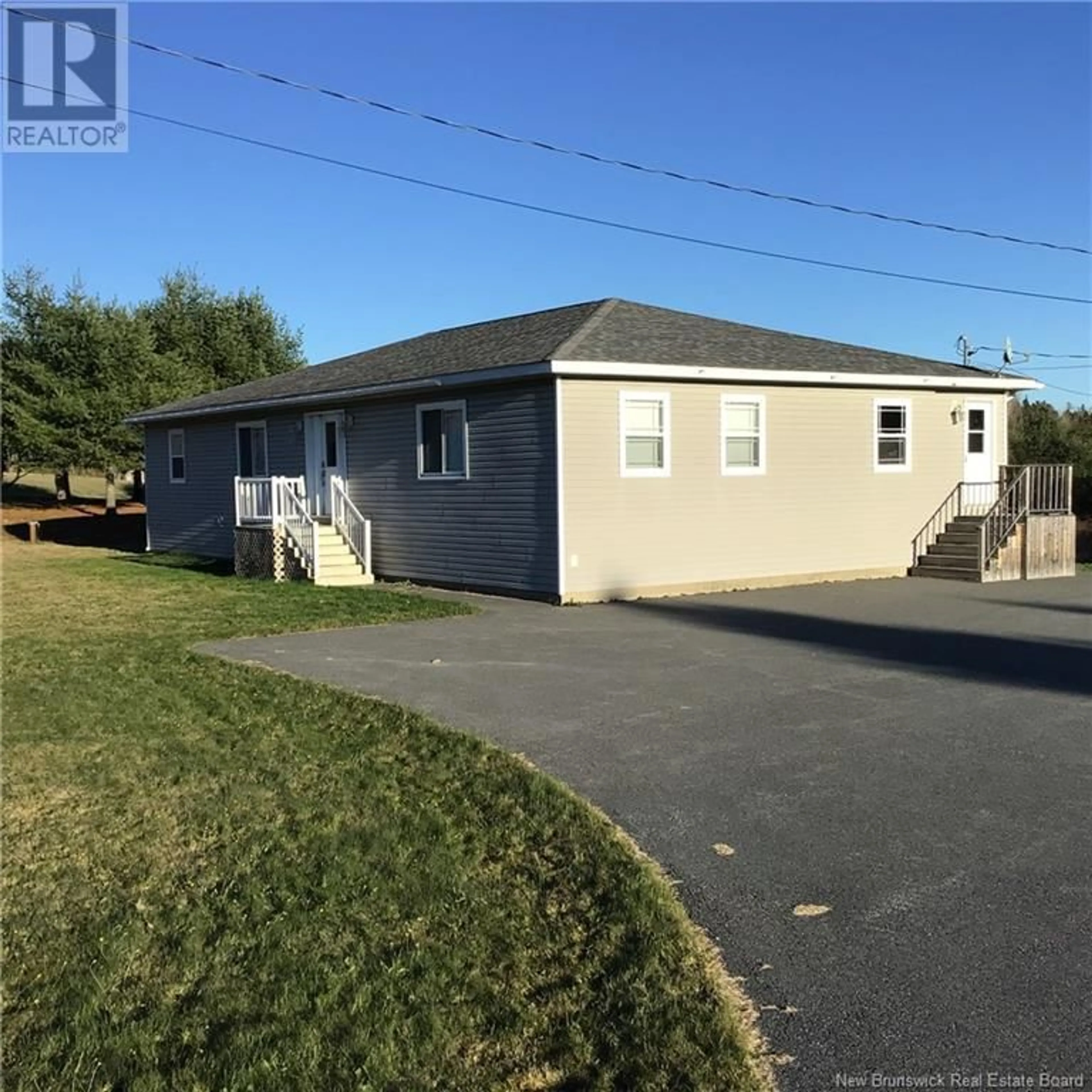 Frontside or backside of a home, the fenced backyard for 332 RT 170 Route, Oak Bay New Brunswick E3L3Y1