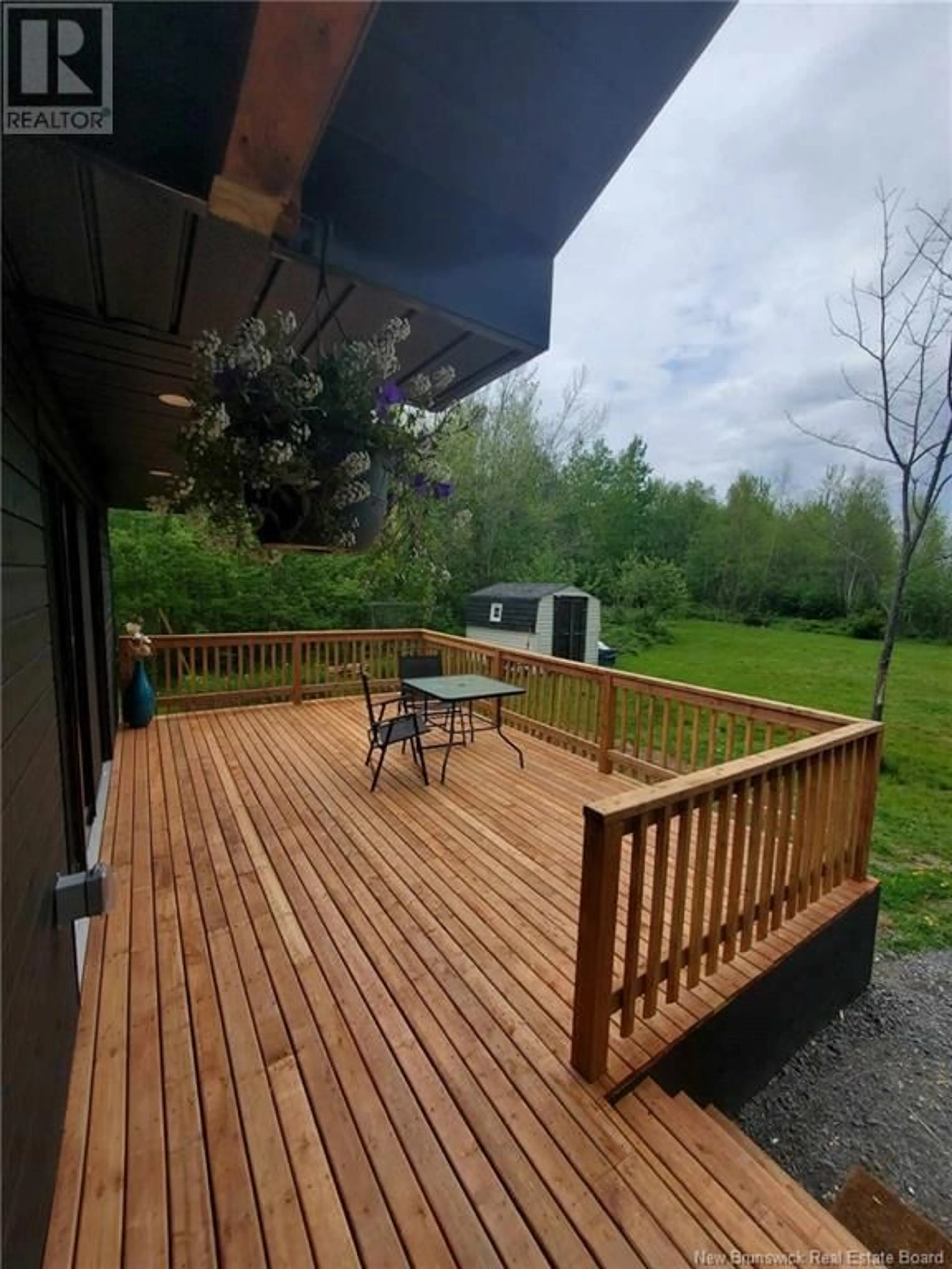 Patio, the fenced backyard for 11 Young Lane, Bass River New Brunswick E4T1B1