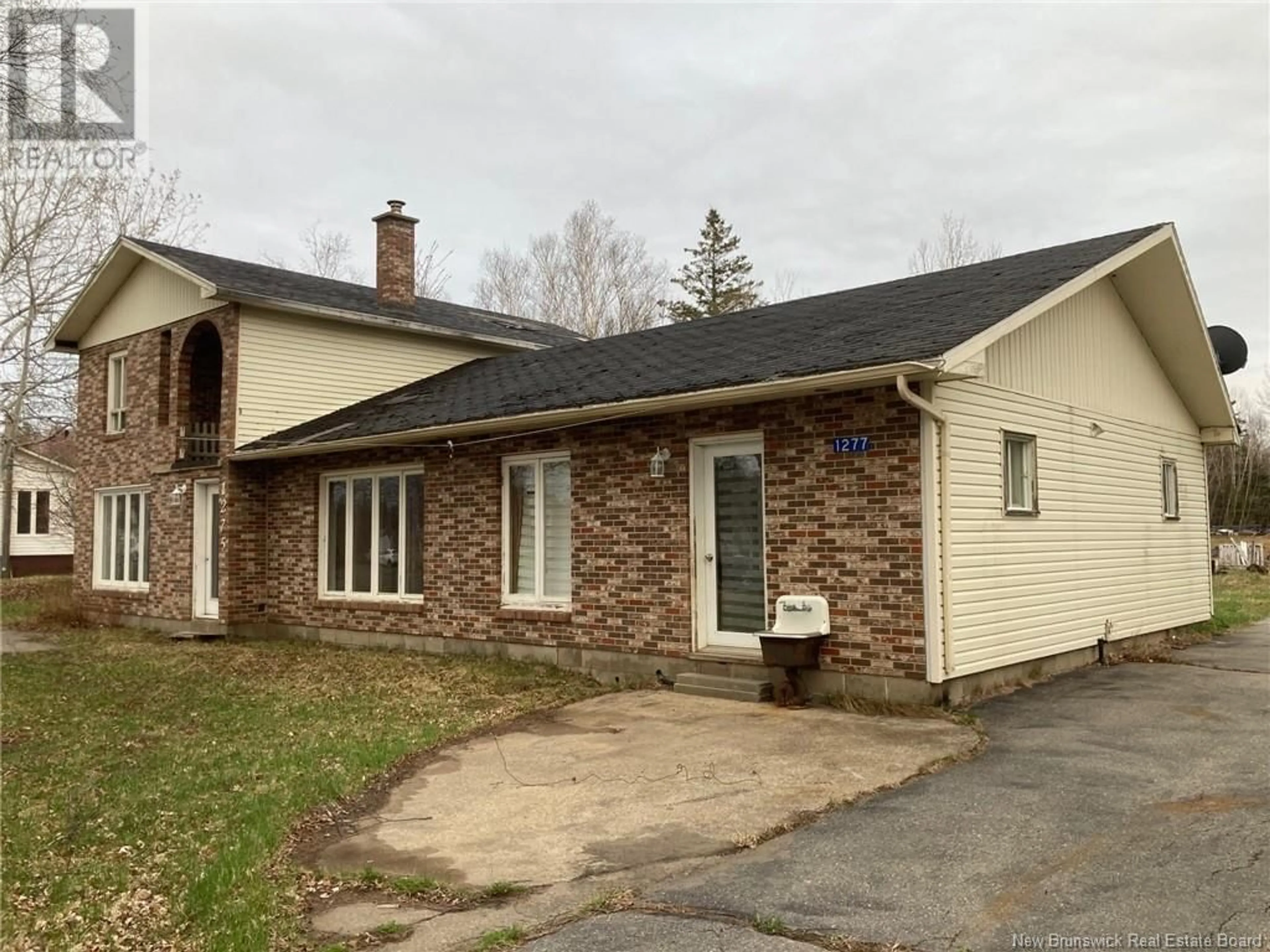Home with brick exterior material, street for 1275 BOULEVARD ST-JOSEPH, Saint-Léolin New Brunswick E8N2T3