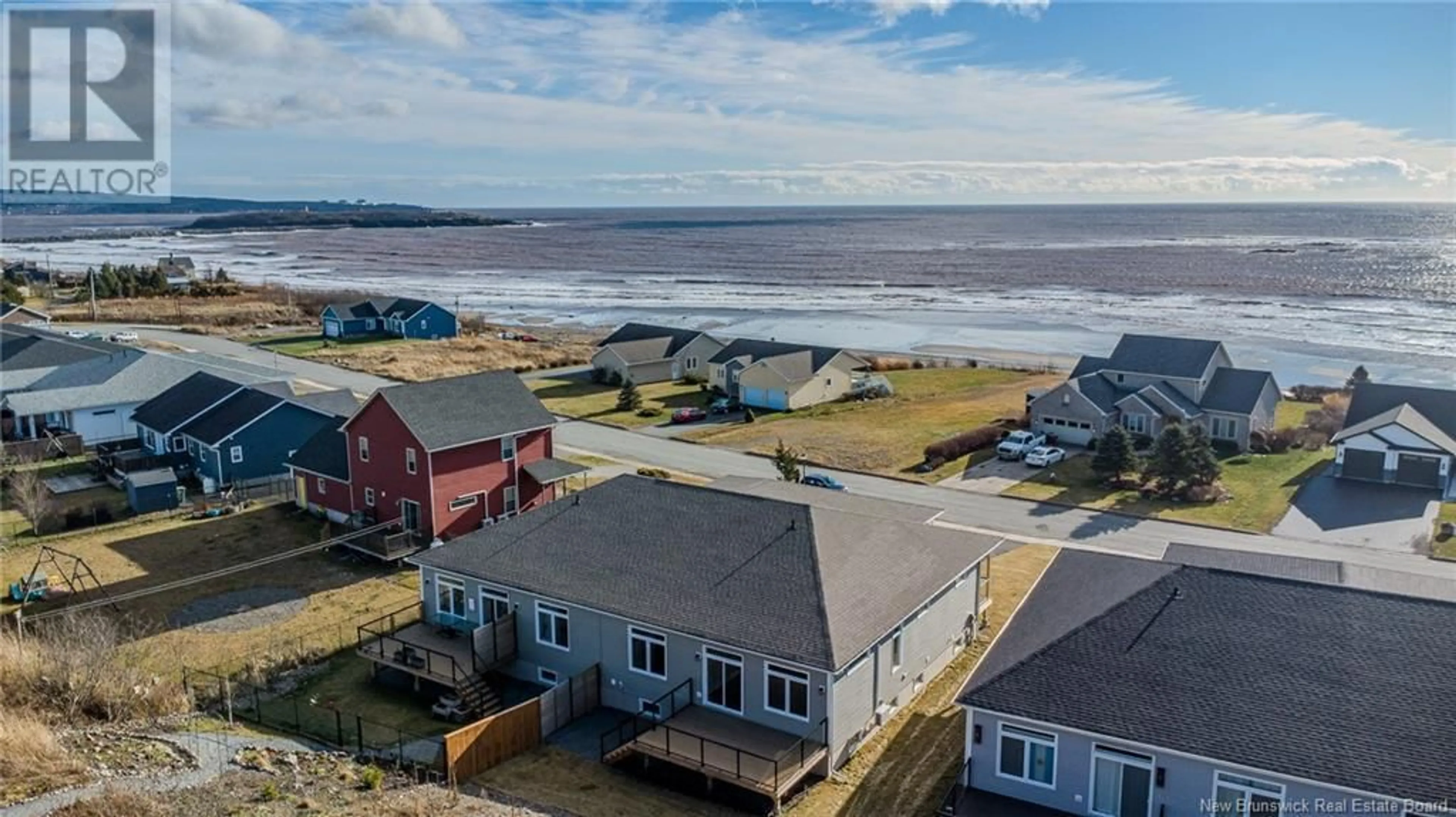 A pic from outside/outdoor area/front of a property/back of a property/a pic from drone, water/lake/river/ocean view for 630 Sea Street, Saint John New Brunswick E2M2N4