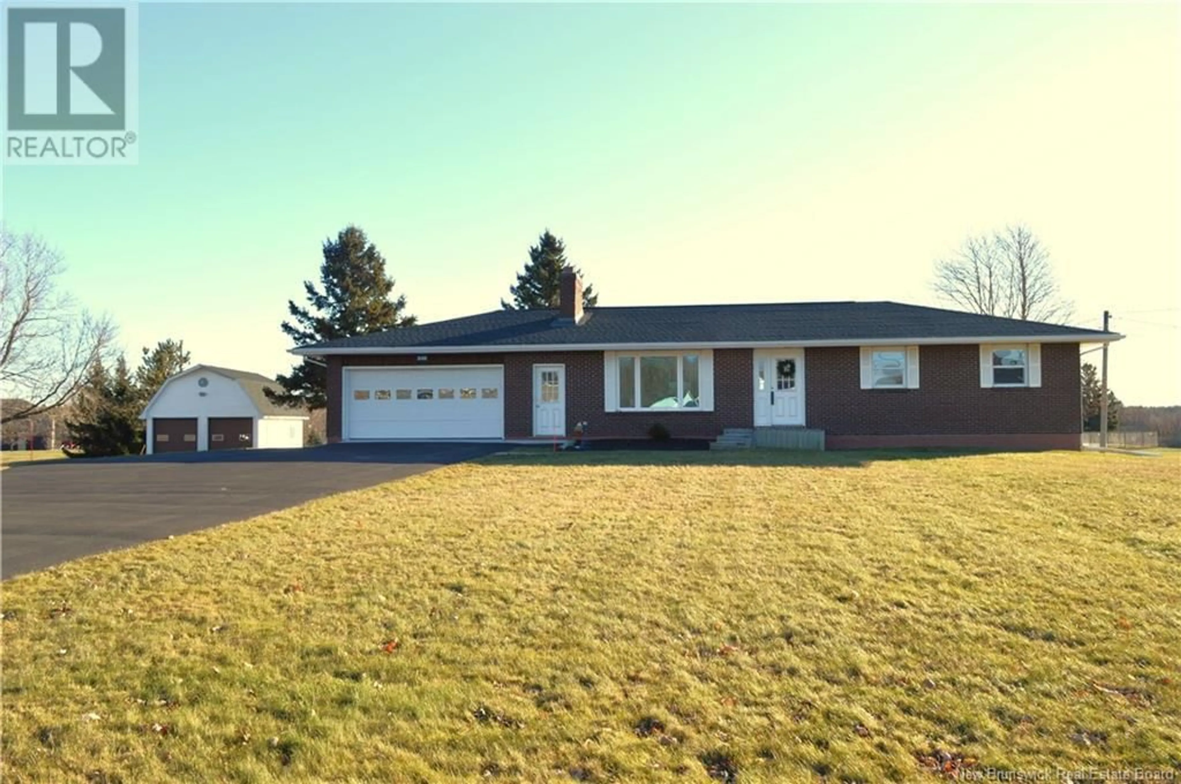 Home with vinyl exterior material, street for 248 Irving Boulevard, Bouctouche New Brunswick E4S3L7