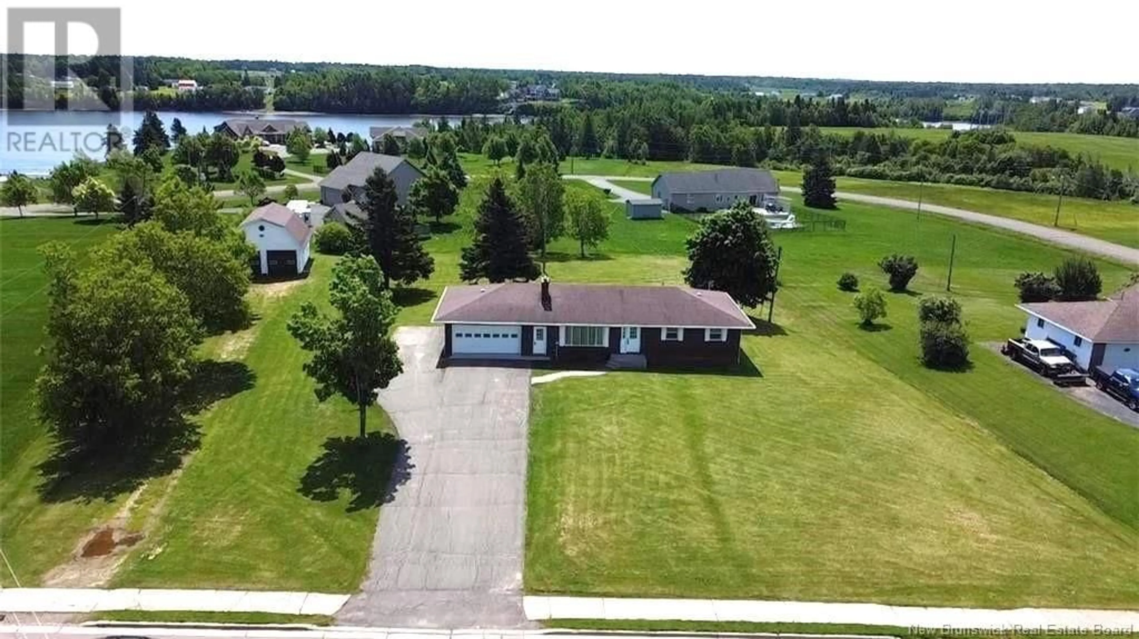 A pic from outside/outdoor area/front of a property/back of a property/a pic from drone, water/lake/river/ocean view for 248 Irving Boulevard, Bouctouche New Brunswick E4S3L7