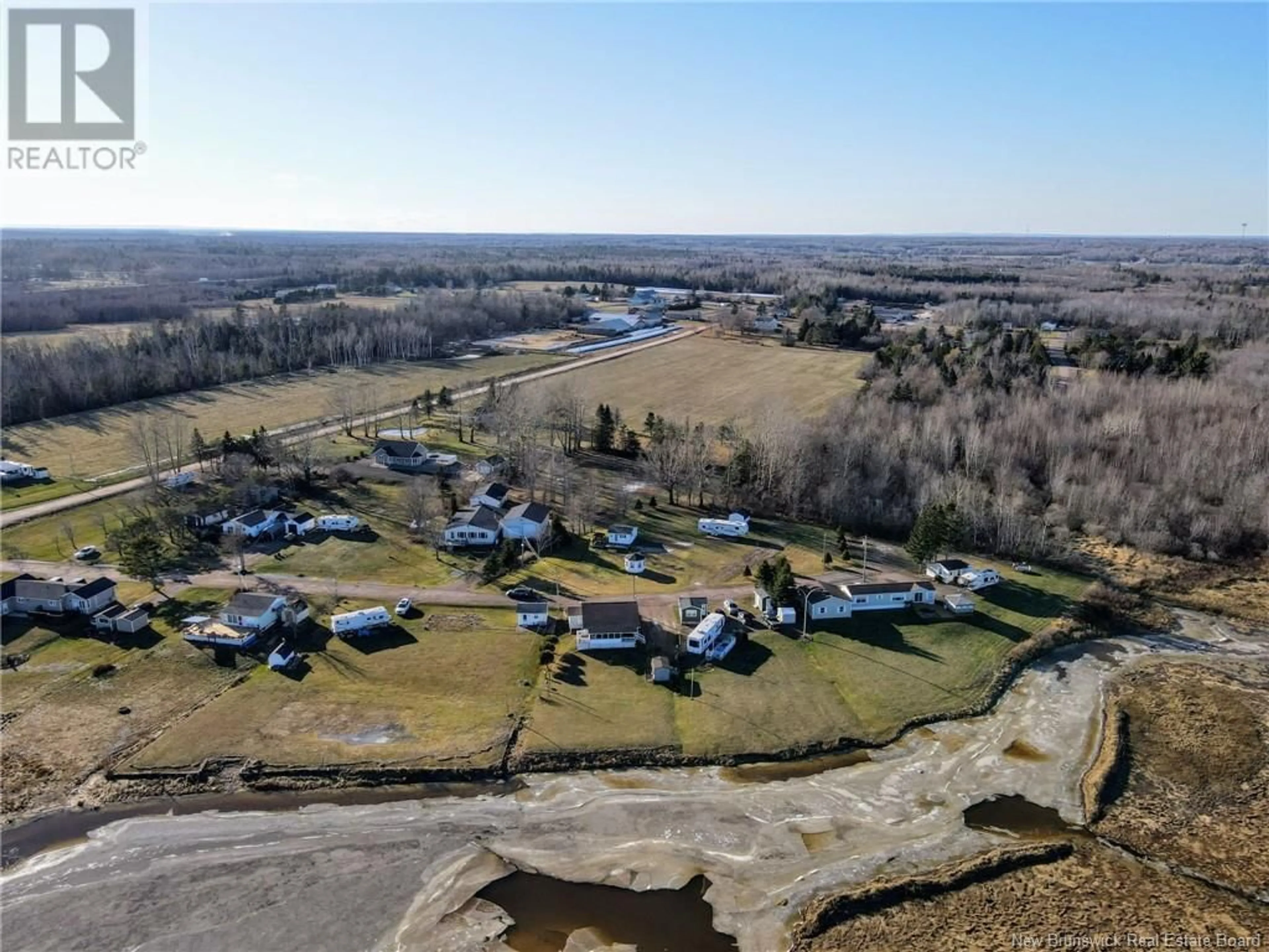 A pic from outside/outdoor area/front of a property/back of a property/a pic from drone, water/lake/river/ocean view for 51 Thibodeau Street, Grand-Barachois New Brunswick E4P8P4