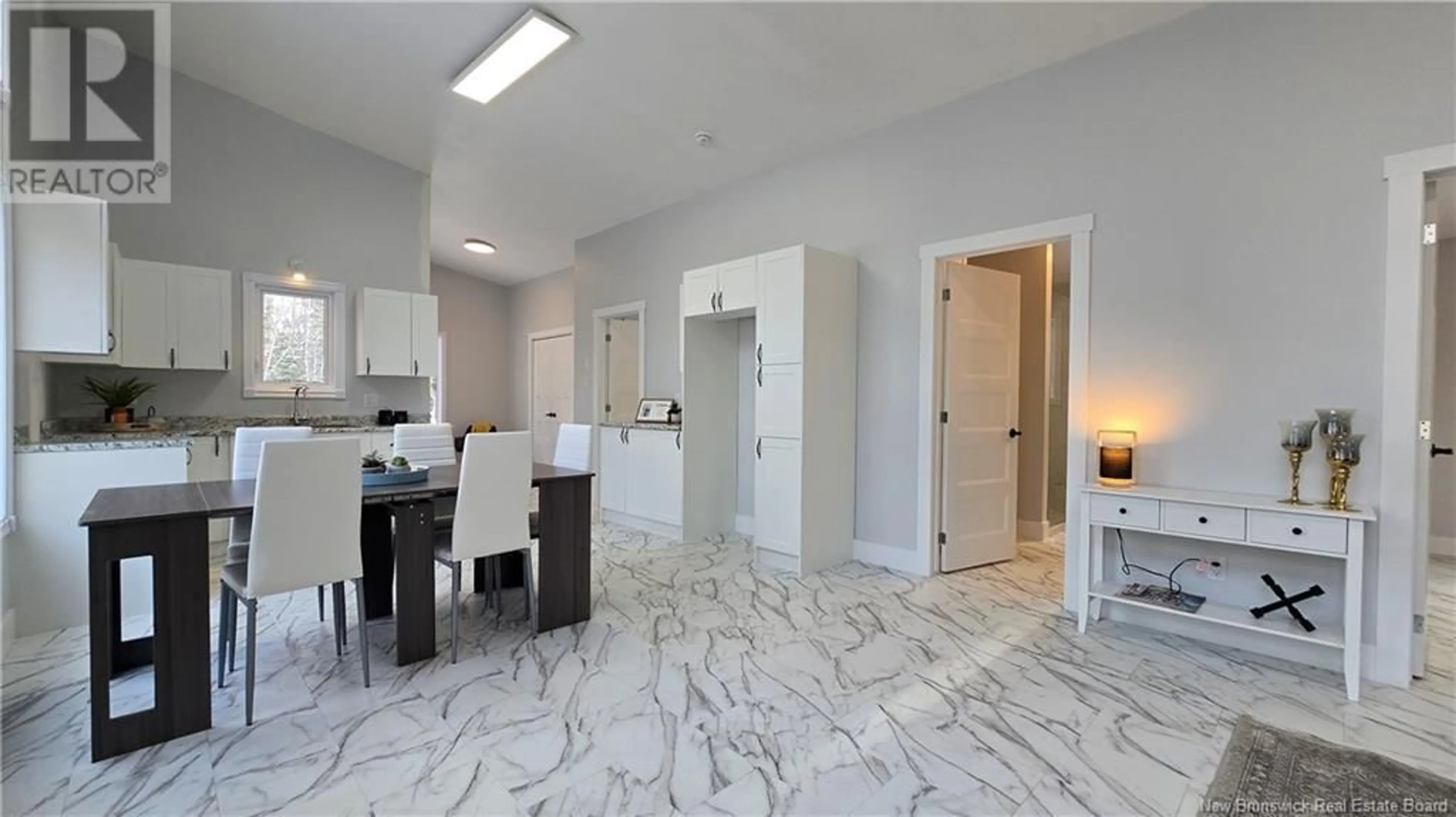Open concept kitchen, ceramic/tile floor for 624 RUE DU PORTAGE, Caraquet New Brunswick E1W1A8