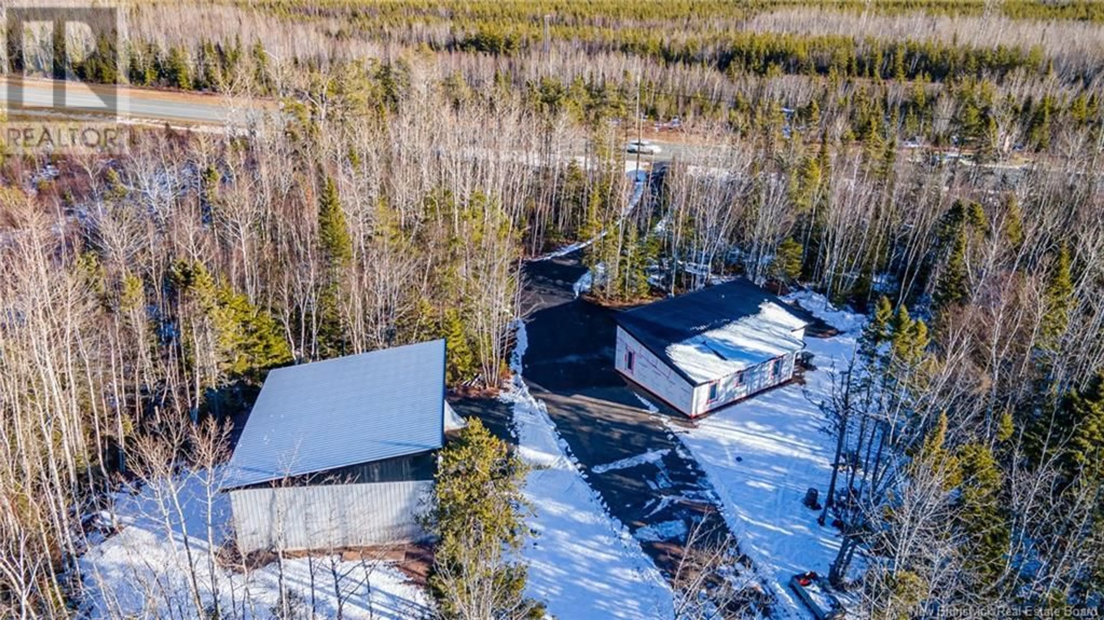 A pic from outside/outdoor area/front of a property/back of a property/a pic from drone, unknown for 624 Rue du Portage, Caraquet New Brunswick E1W1A8