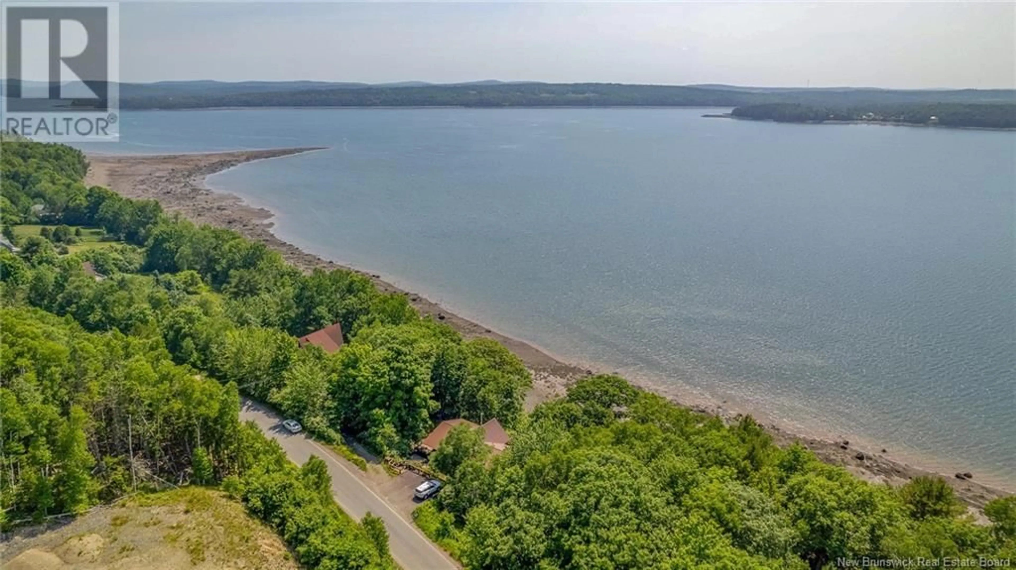 A pic from outside/outdoor area/front of a property/back of a property/a pic from drone, water/lake/river/ocean view for 176 Hills Point Road, Oak Bay New Brunswick E3L4J7