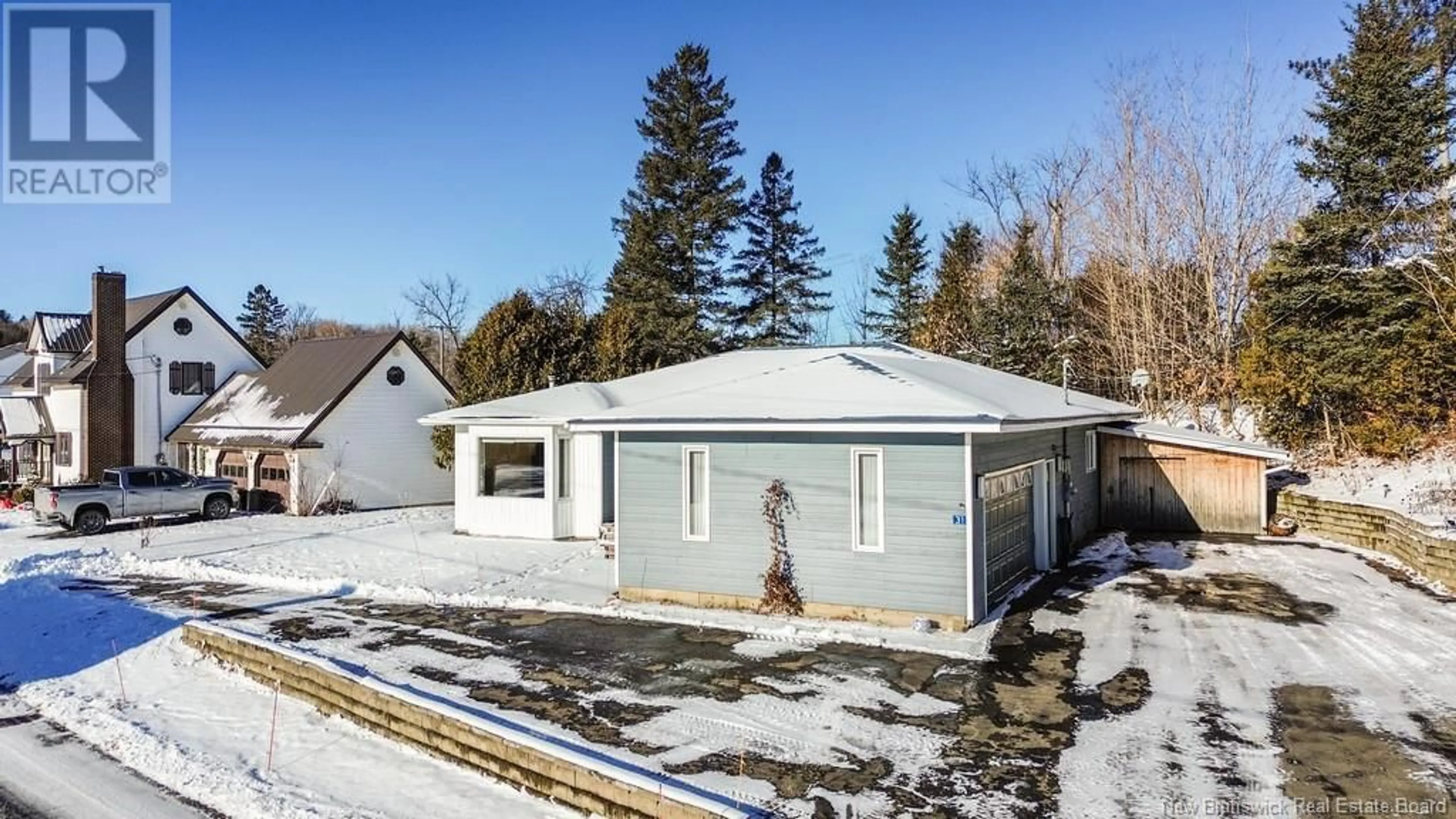 Home with vinyl exterior material, street for 31 Maple Street, Florenceville-Bristol New Brunswick E7L3H1