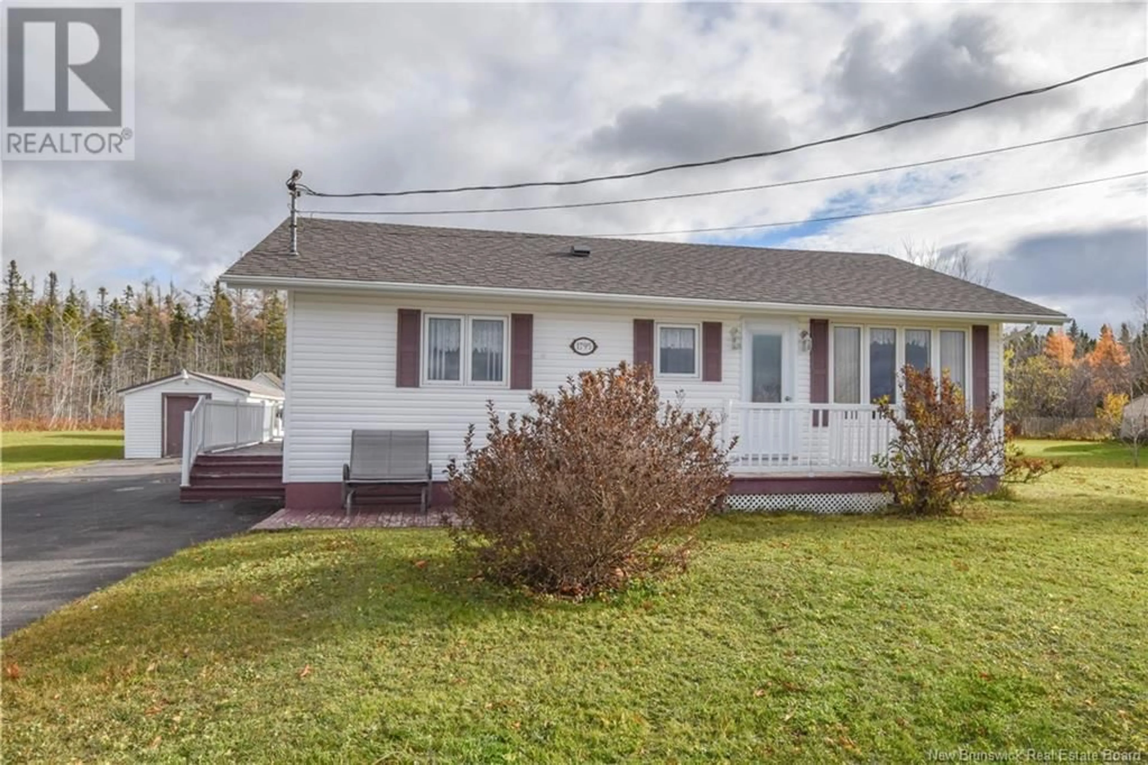 Home with vinyl exterior material, street for 1795 ROUTE 335, Saint-Simon New Brunswick E8P2A7
