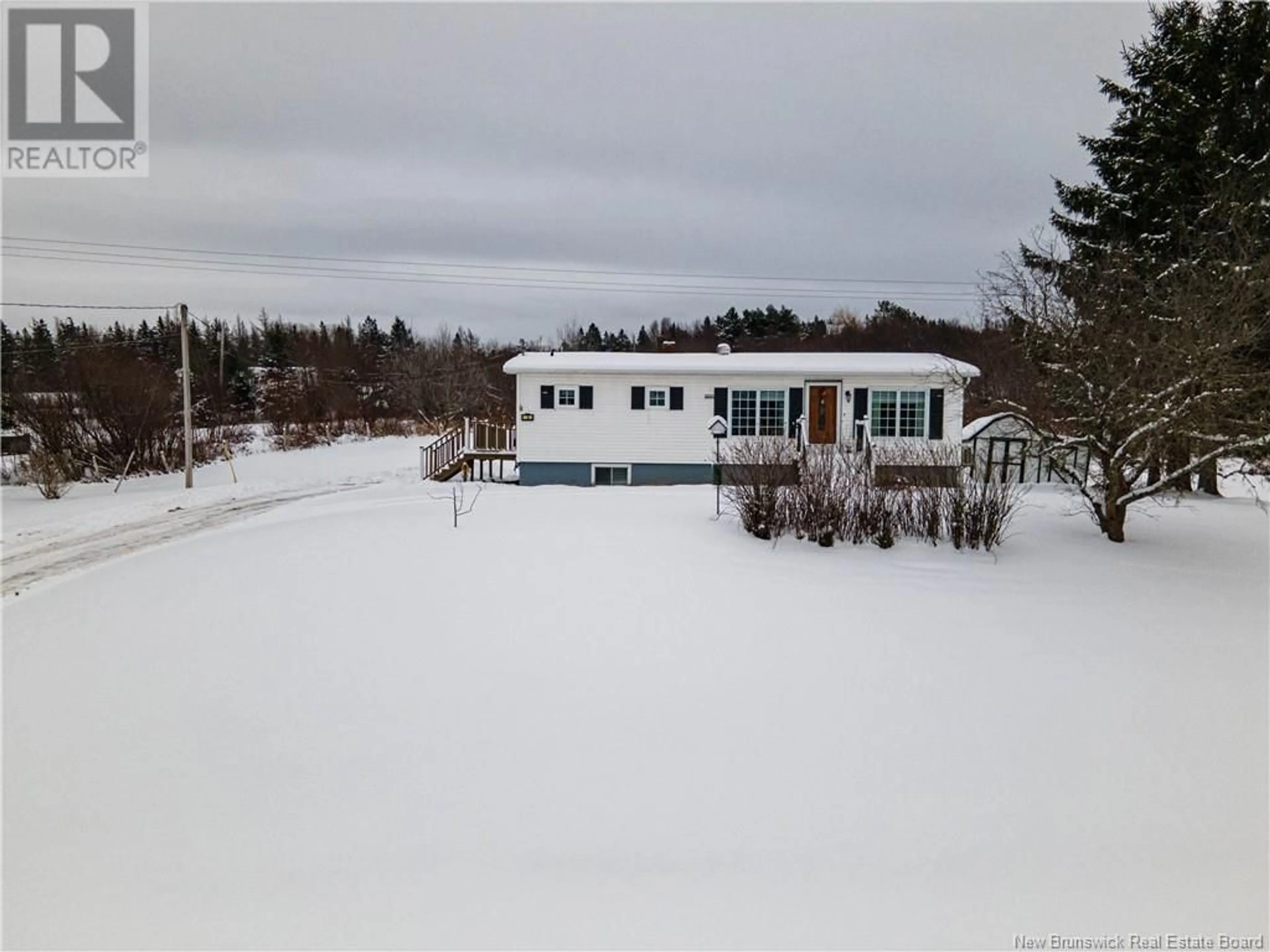 A pic from outside/outdoor area/front of a property/back of a property/a pic from drone, water/lake/river/ocean view for 19 Sunset Avenue, Apohaqui New Brunswick E5P3R2