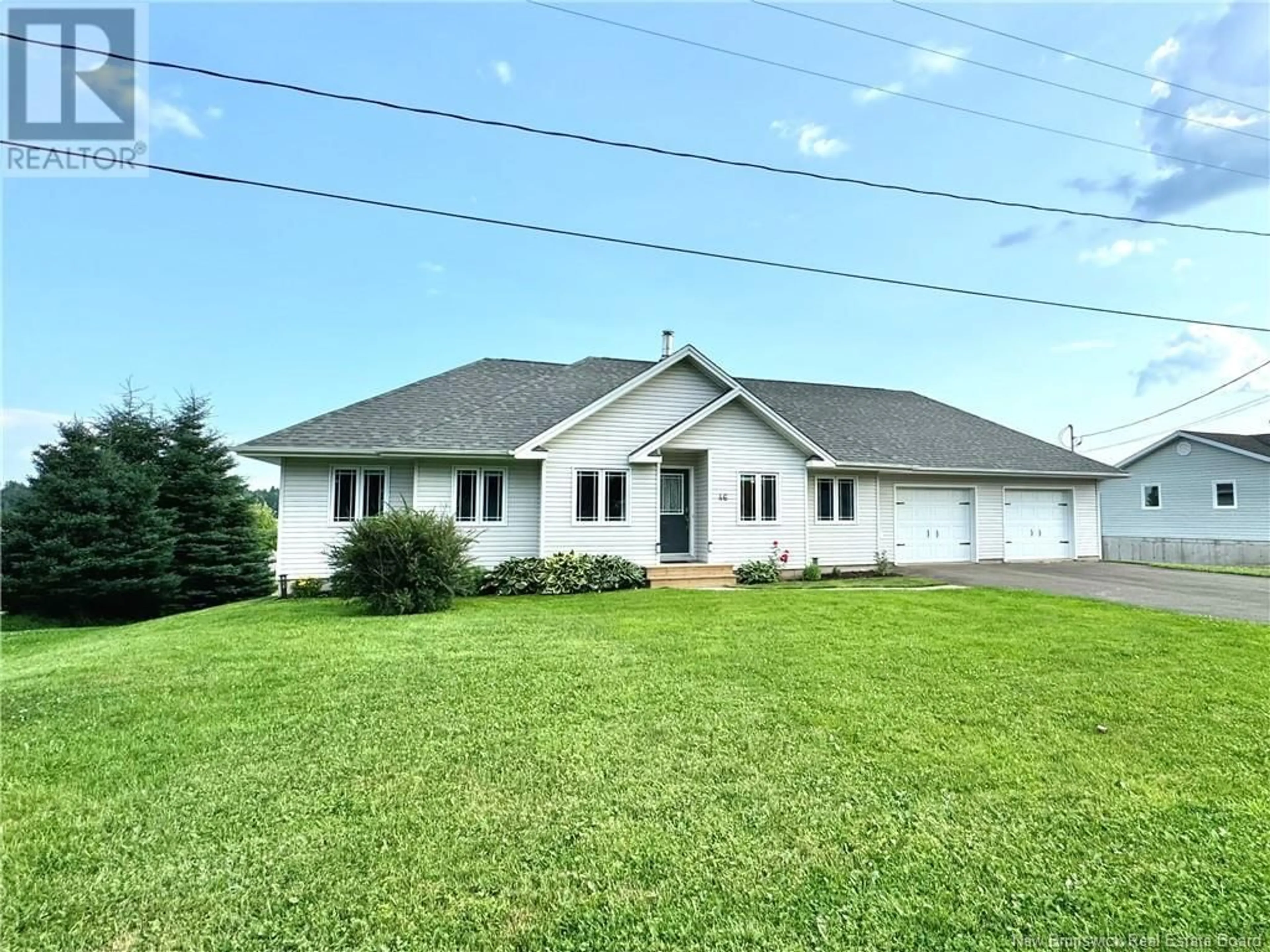 A pic from outside/outdoor area/front of a property/back of a property/a pic from drone, street for 46 Green Briar Drive, Boundary Creek New Brunswick E1G4B4