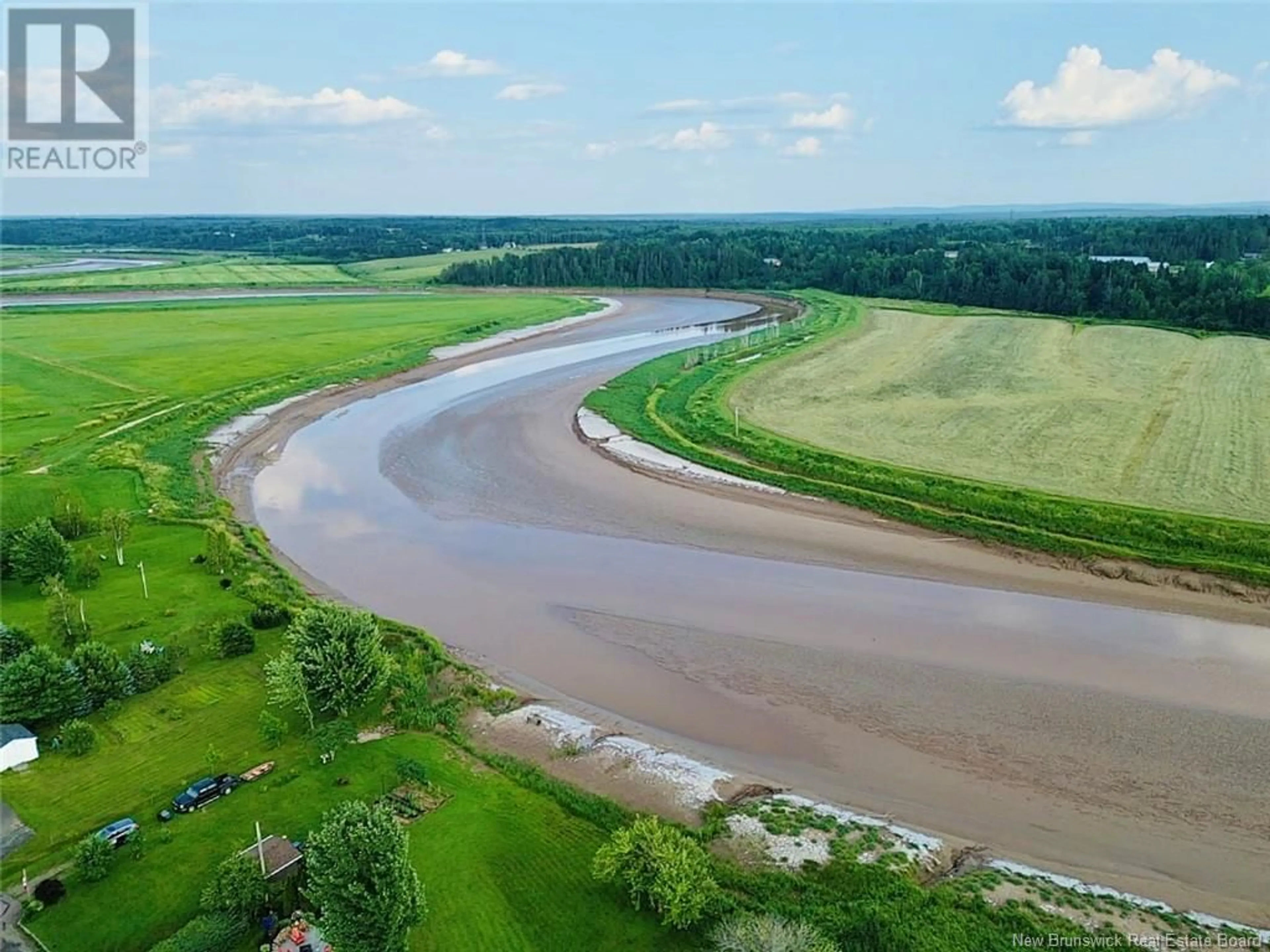 A pic from outside/outdoor area/front of a property/back of a property/a pic from drone, water/lake/river/ocean view for 46 Green Briar Drive, Boundary Creek New Brunswick E1G4B4