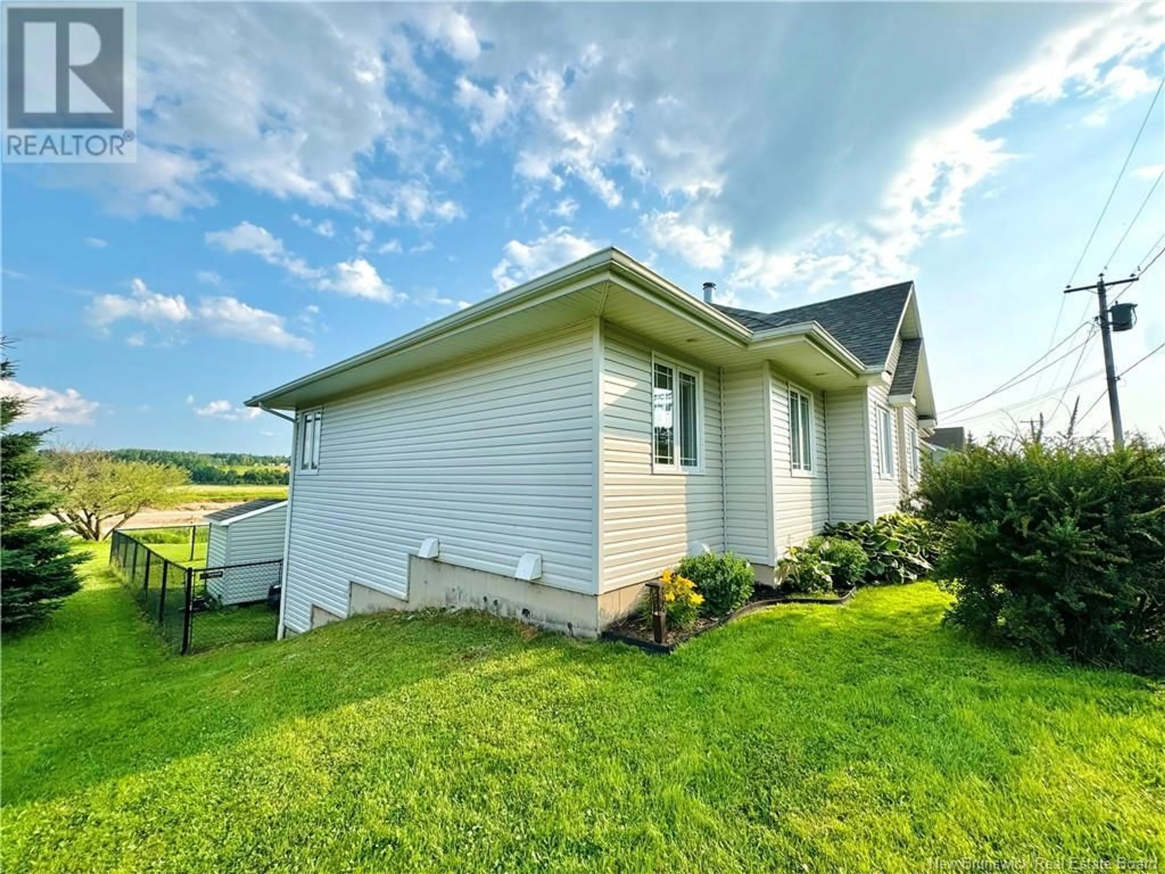 A pic from outside/outdoor area/front of a property/back of a property/a pic from drone, water/lake/river/ocean view for 46 Green Briar Drive, Boundary Creek New Brunswick E1G4B4