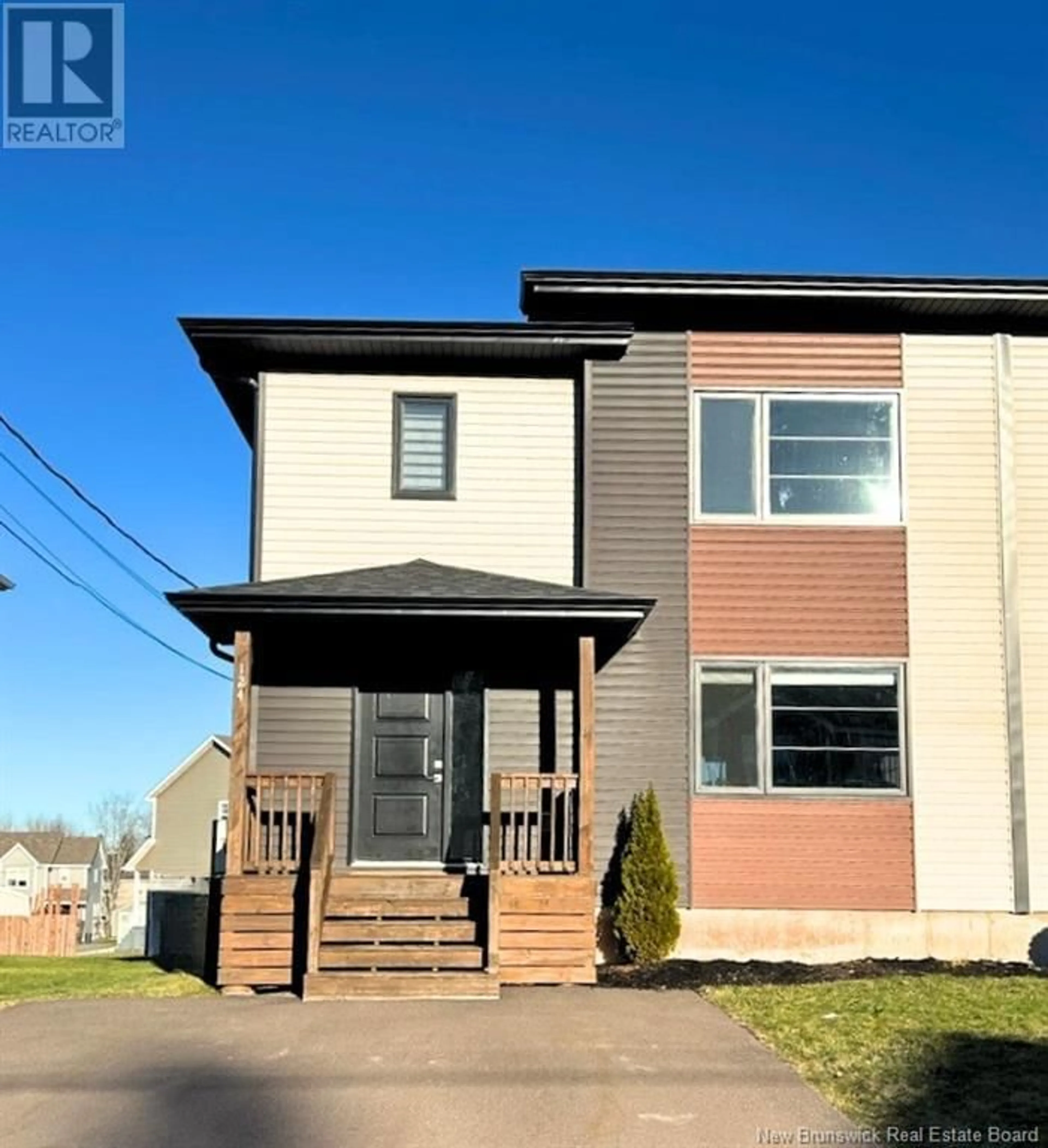 Home with vinyl exterior material, street for 124 Des Erables Street, Dieppe New Brunswick E1A9B2