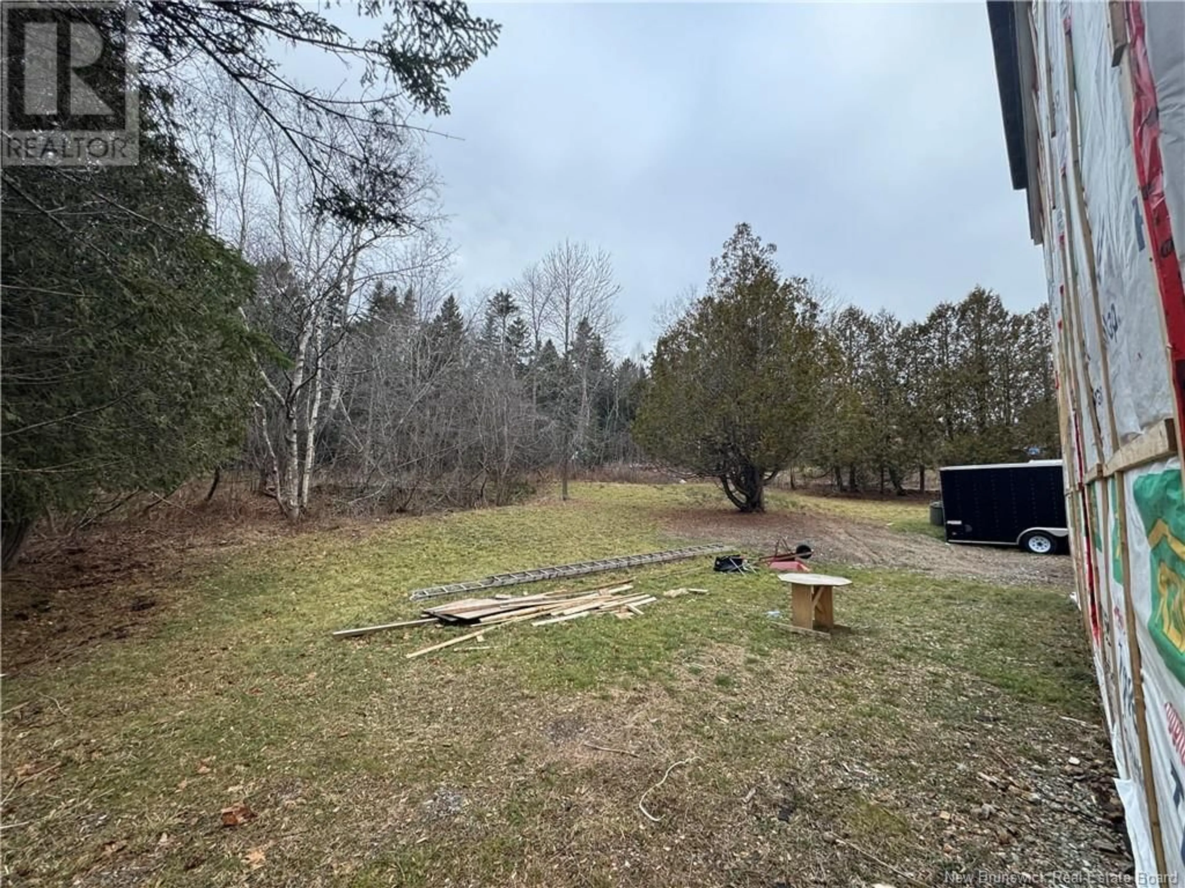 A pic from outside/outdoor area/front of a property/back of a property/a pic from drone, forest/trees view for 227 Hammond River Road, Quispamsis New Brunswick E2G1G7