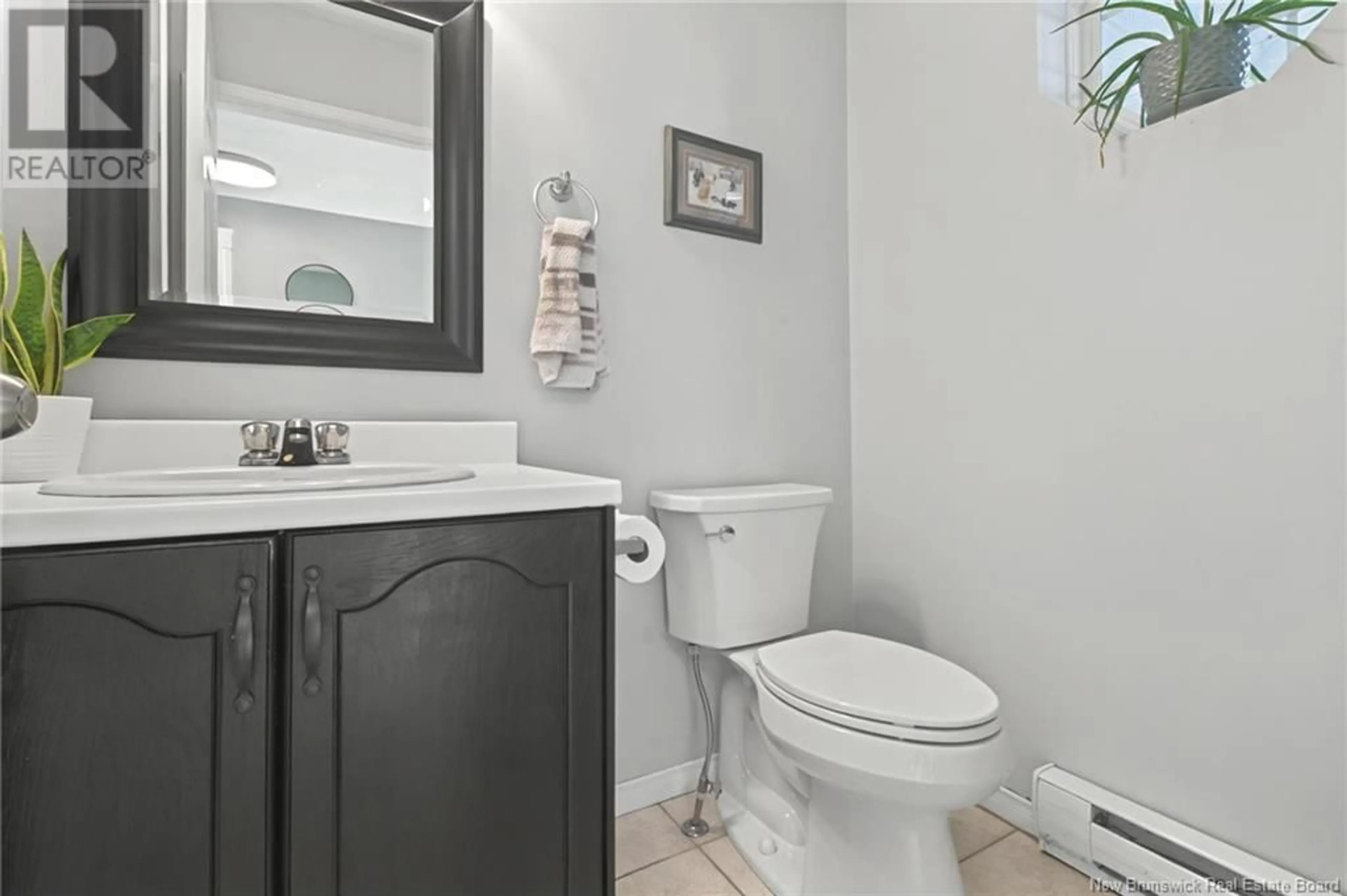 Standard bathroom, ceramic/tile floor for 57 Armoyan Court, Moncton New Brunswick E1G4T5