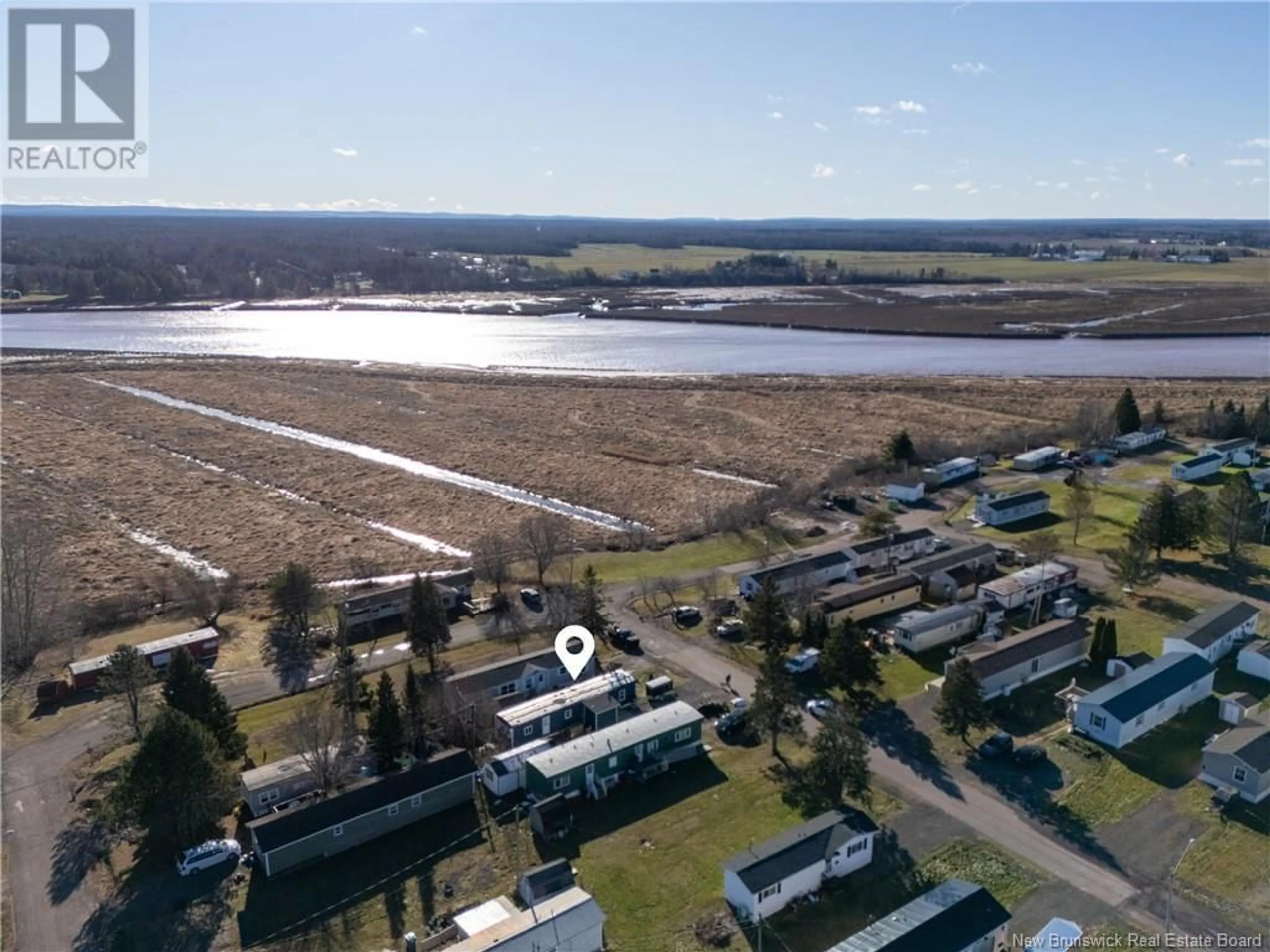 A pic from outside/outdoor area/front of a property/back of a property/a pic from drone, water/lake/river/ocean view for 41 Gerald Boulevard, Moncton New Brunswick E1E3T3