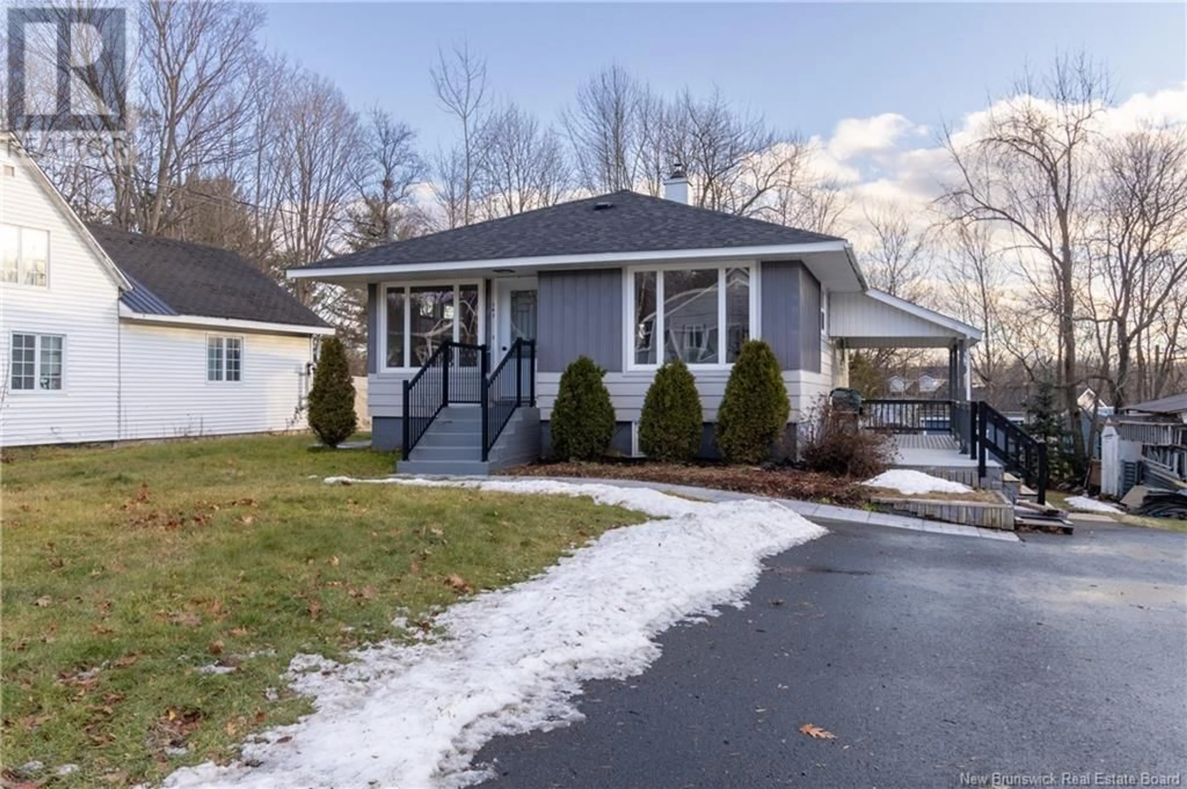 Home with vinyl exterior material, street for 143 Elm Street, Woodstock New Brunswick E7M1T7